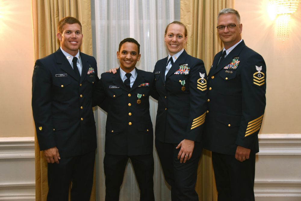 The 2016 Enlisted Persons of the Year pose for a photo with the 2015 Enlisted Persons of the Year following the 2016 Coast Guard Enlisted Persons of the Year Banquet at Fort McNair in Washington