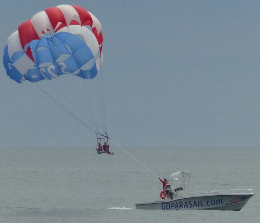 Stone Harbor Mayor Judith Davies-Dunhour parasails in to help open Stone Harbor's beach May 27.