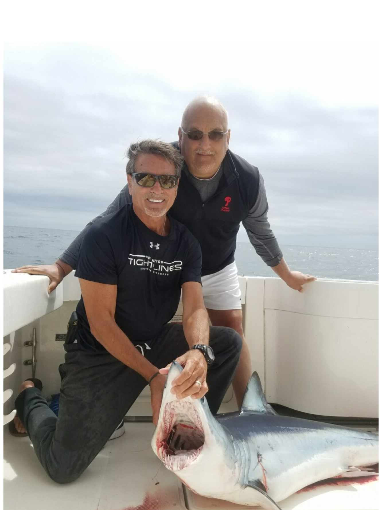 Peter and Bobby DiLullo with a 130-pound mako. 