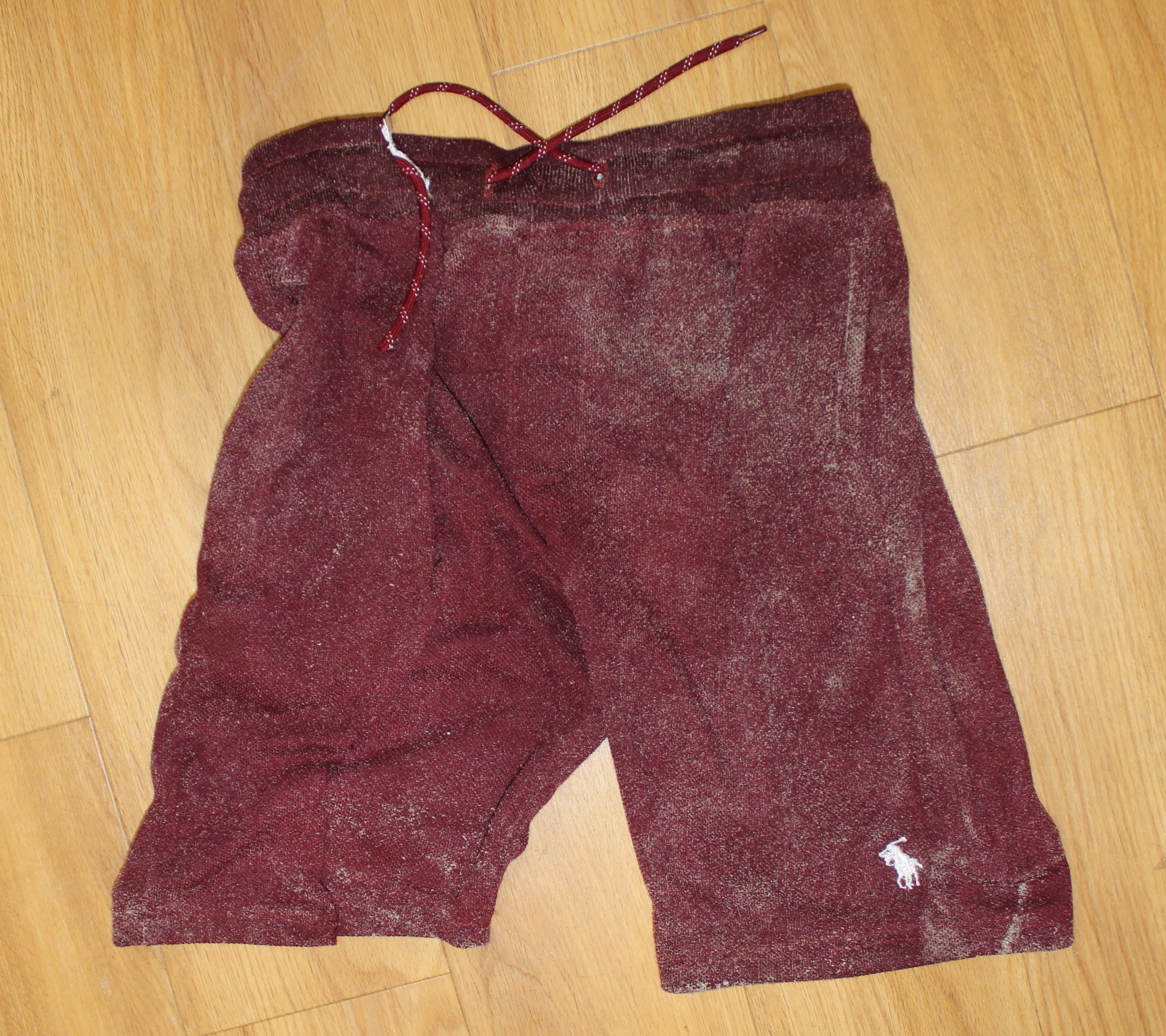 Police say the victim was wearing these maroon Polo cotton shorts when he was found. 