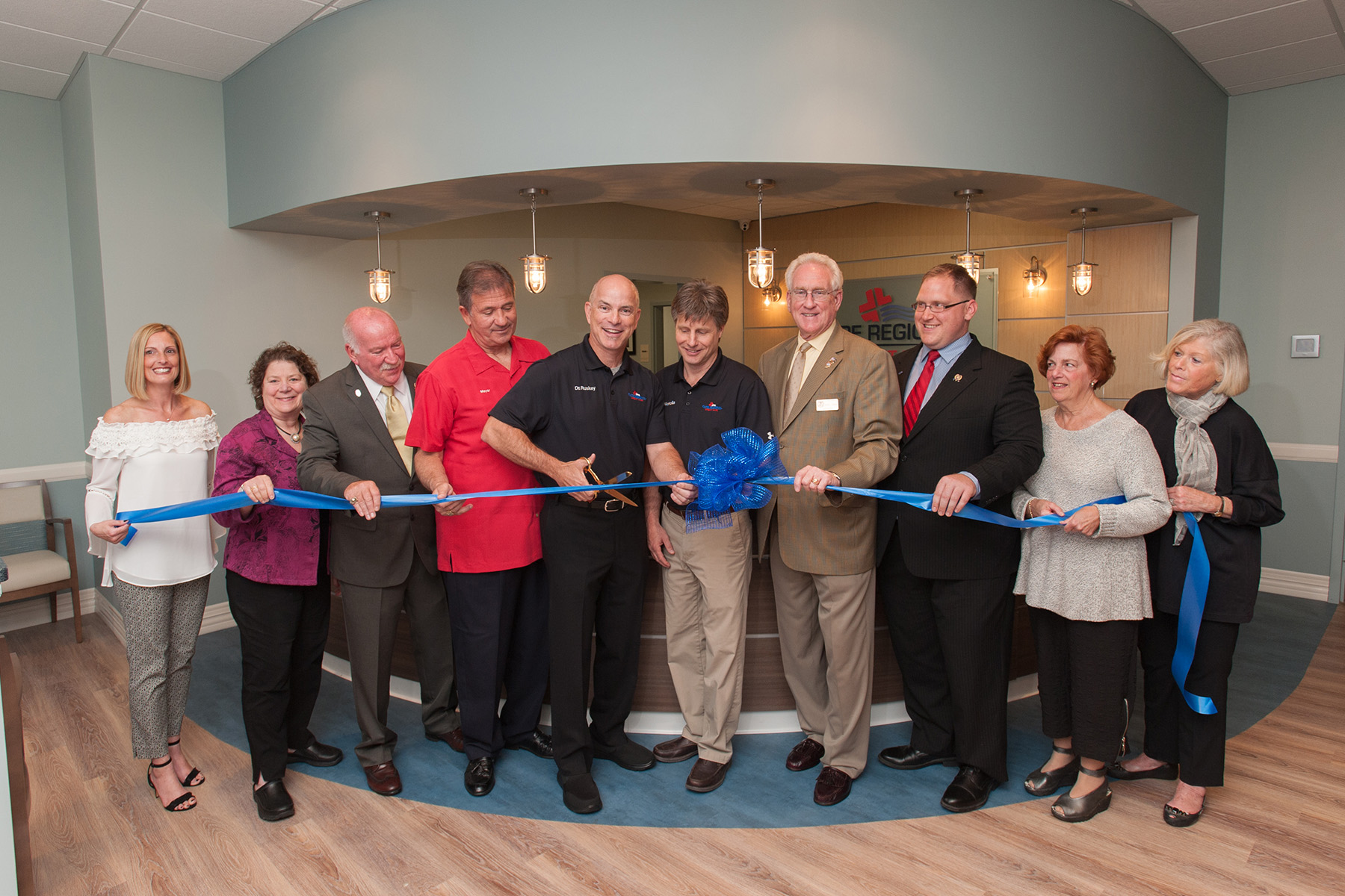 Cape Regional Health System executives joined the staff of the new Cape Regional Urgent Care at Wildwood at an open house and ribbon cutting ceremony. From left: Kris Gereaghty