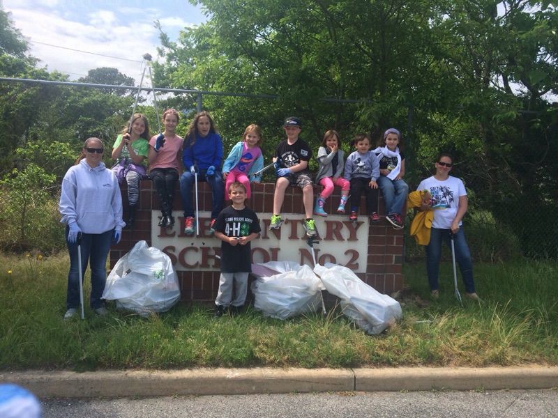 Science Rocks 4-H Club participated in a community clean up in Cape May Court House to raise funds for the new club. From left are Tara