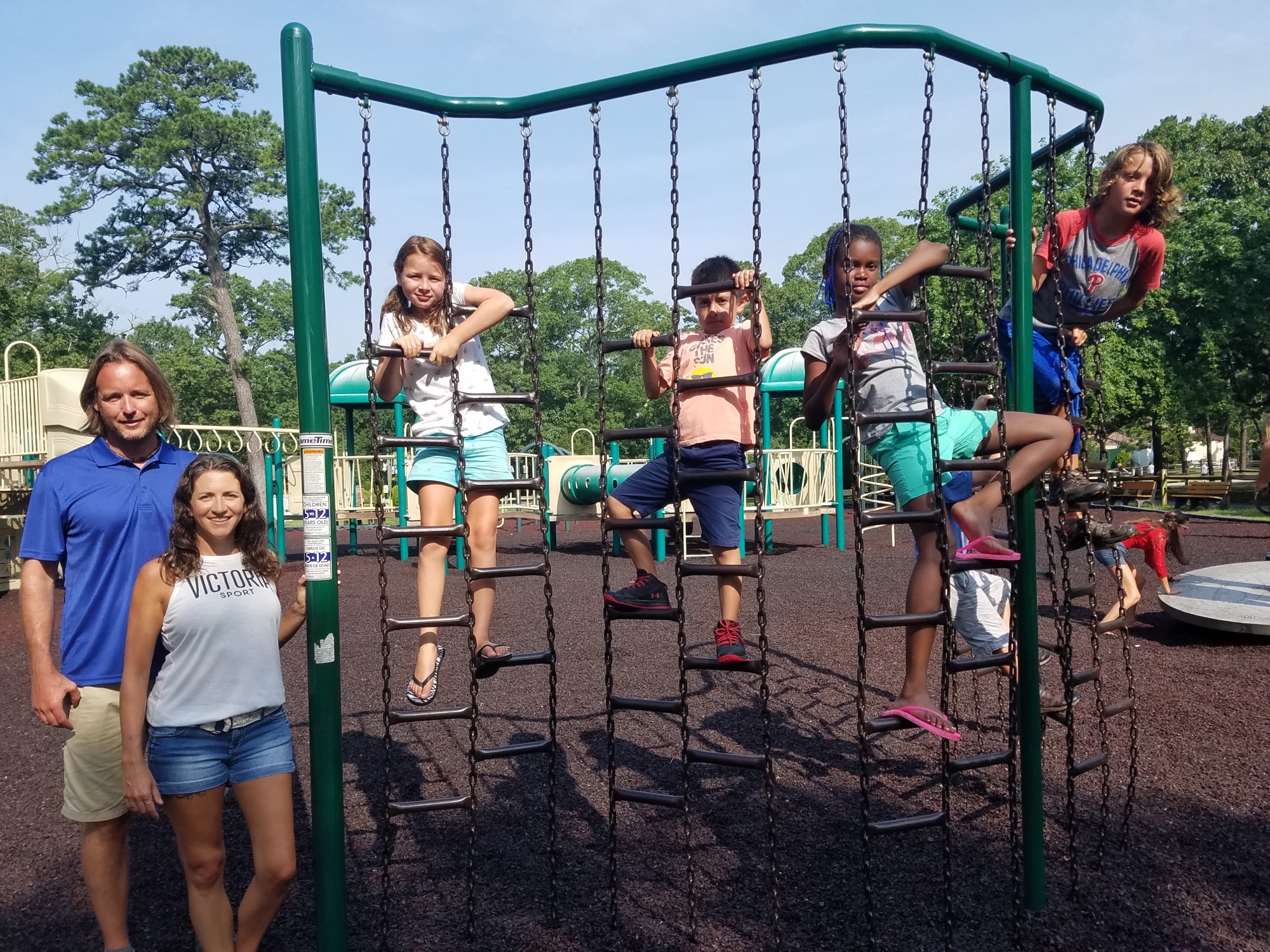 Aaron and Krista Clauser took their children and two Fresh Air Fund children to the park recently