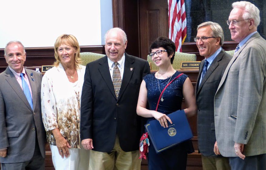 Scholarship recipient Gabrielle Wolf with freeholders Aug. 22. They are