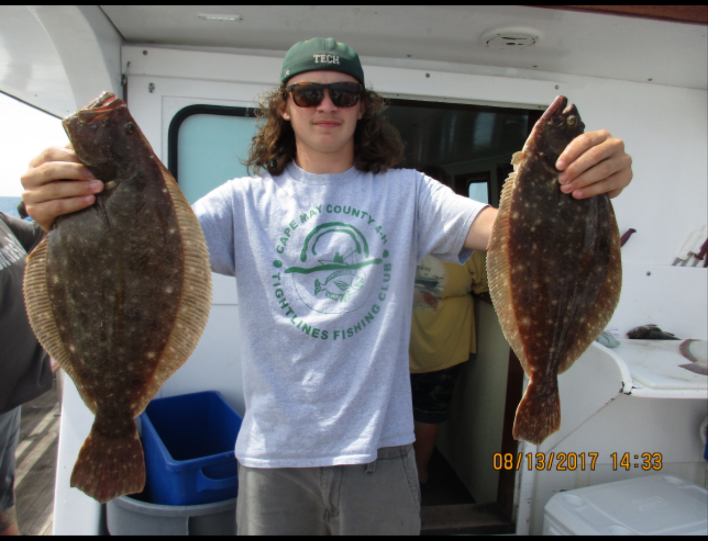 Zachary Robbins and his two keeper flounder. 