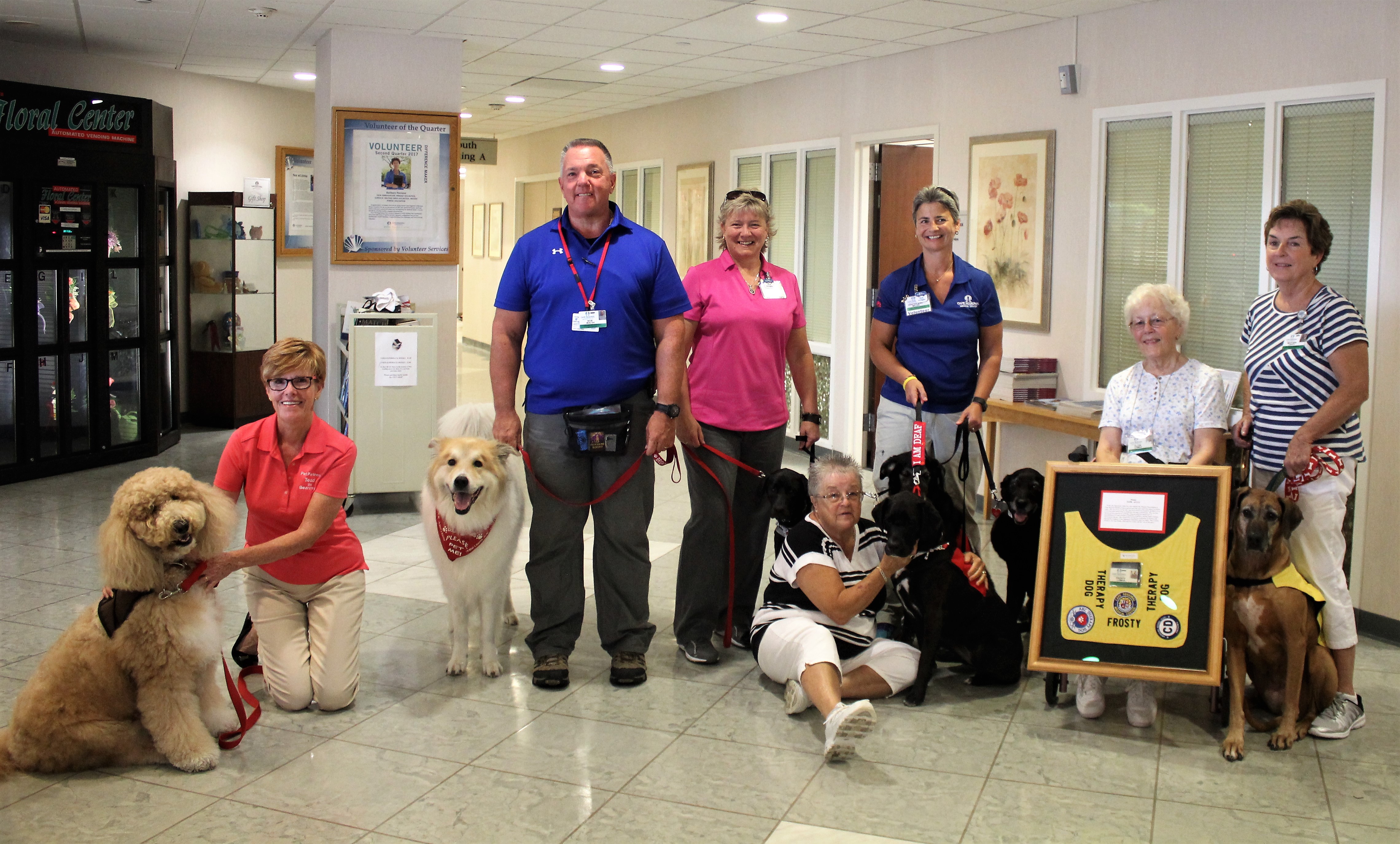 Cape Regional Medical Center’s dog therapy program volunteers. From left