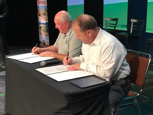 U.S. Agriculture Secretary Perdue signing the SCORE Agreement.