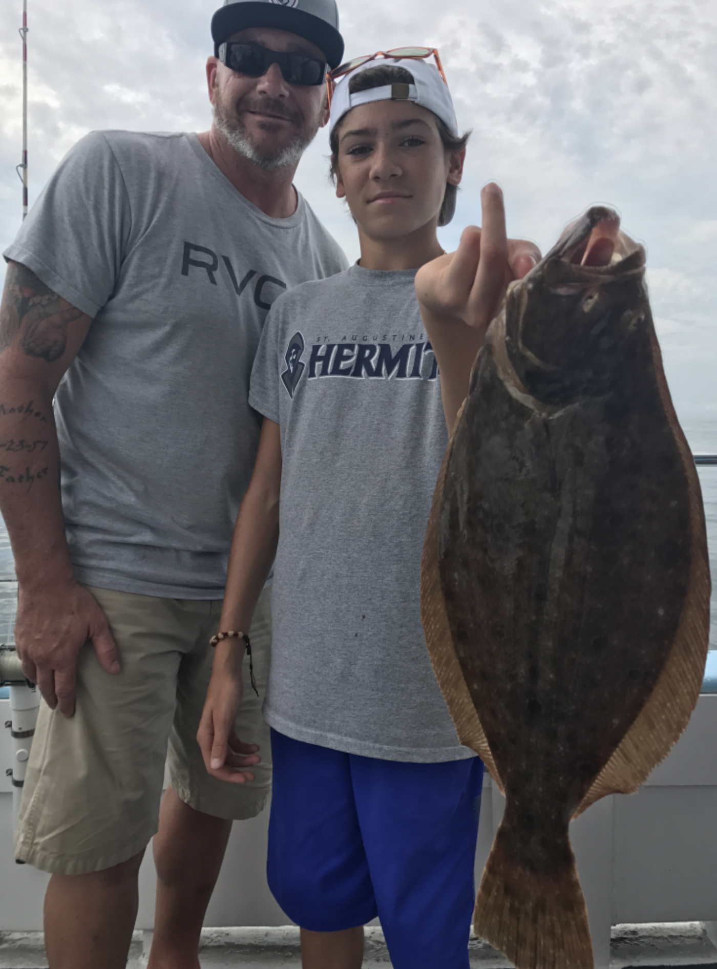 Jeff Lee and his son with their nice flounder. 