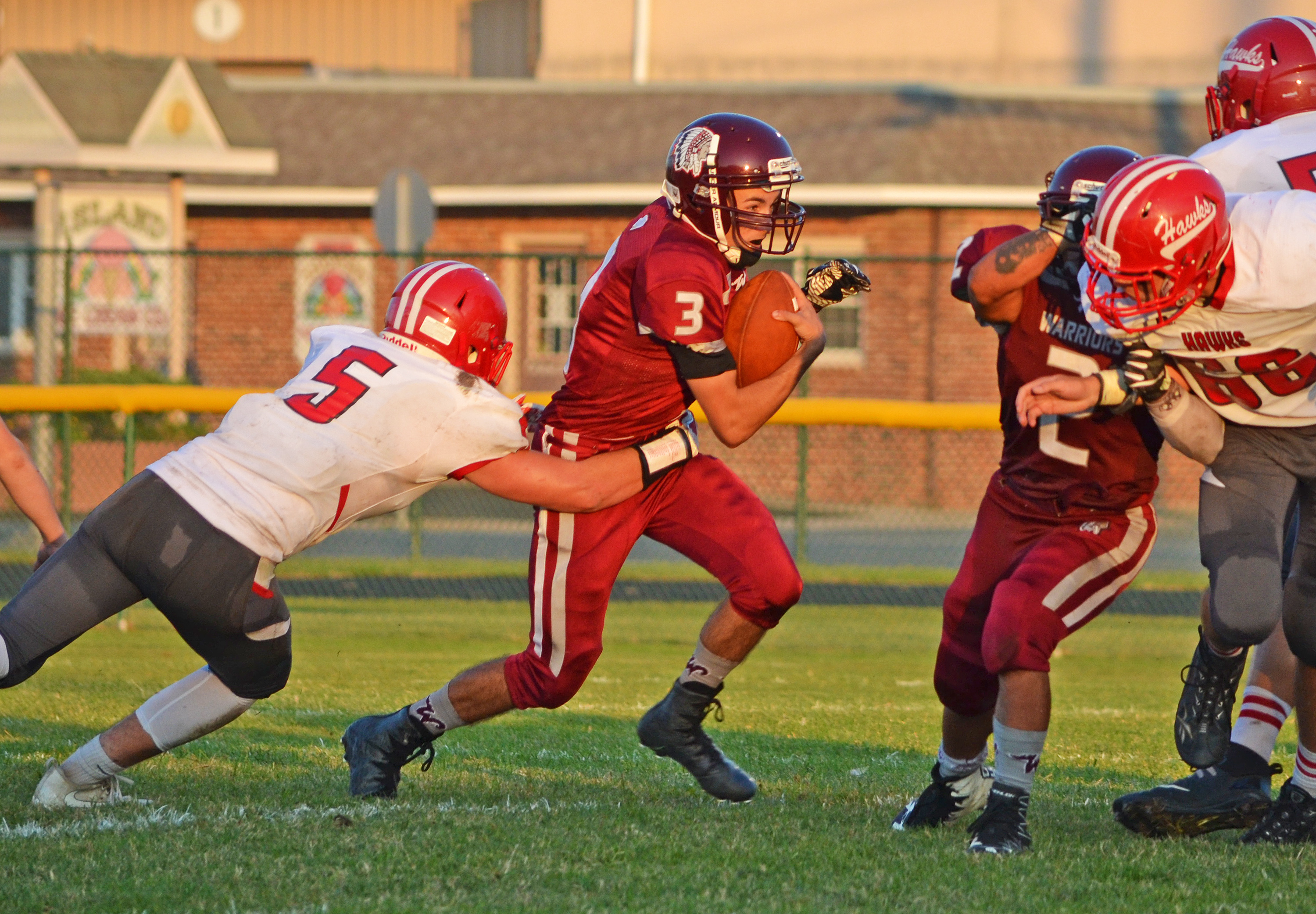 Wildwood High School’s Christian Tyson (3) runs through Haddon Township defense in Sept. 15’s home game at Maxwell Field in Wildwood.