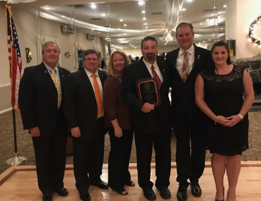 Middle Township Committee presents Volunteer of the Year Award to Jeff McCart for his work with the Middle Township Junior Panthers Football and Cheer Association. Pictured left to right:  Committeeman Tim Donohue