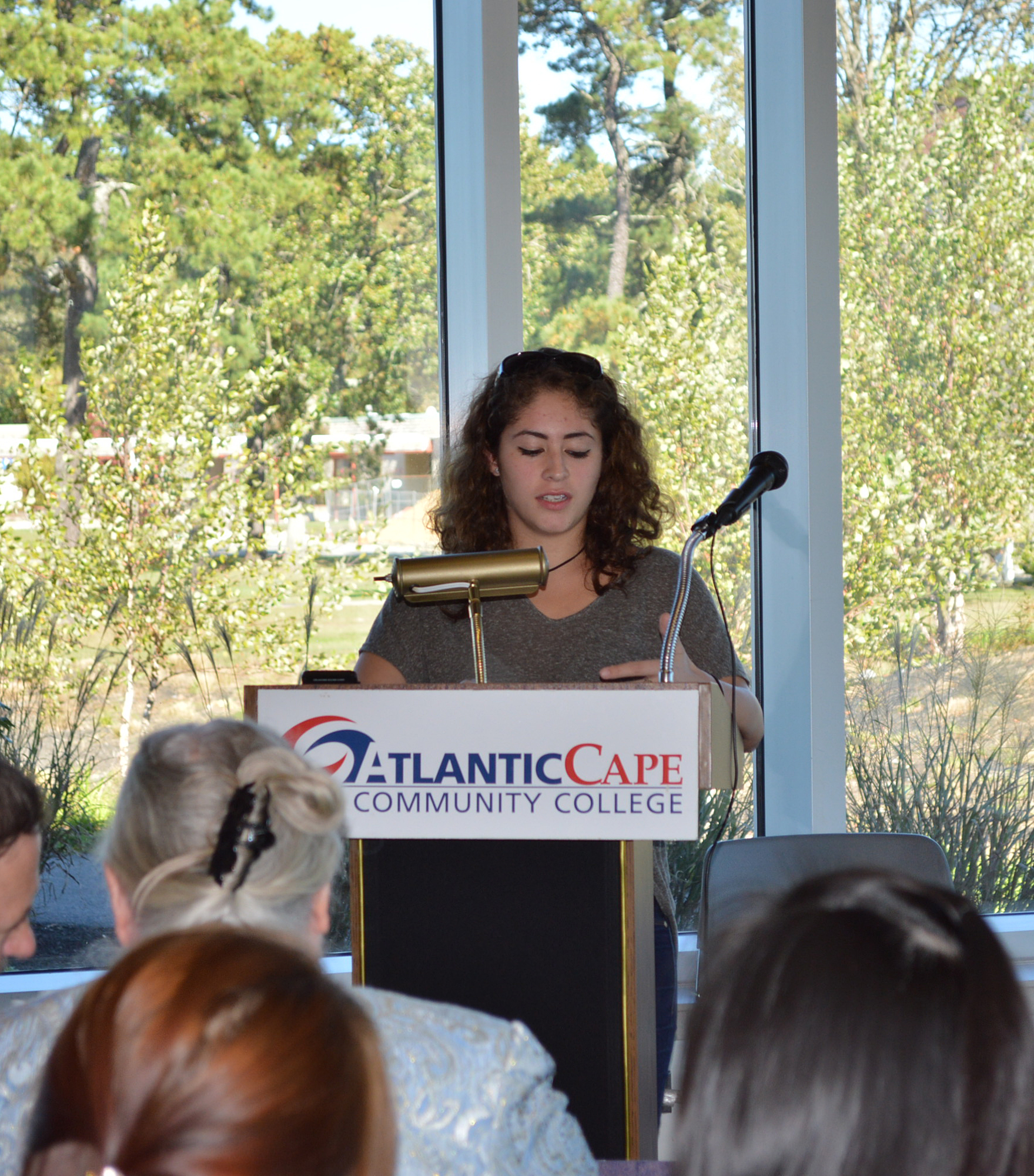 Isabella Aristizabal of Egg Harbor Township reads her third-place essay to attendants at the NJC4 Closing Rally on Oct. 19 at Atlantic Cape Community College.