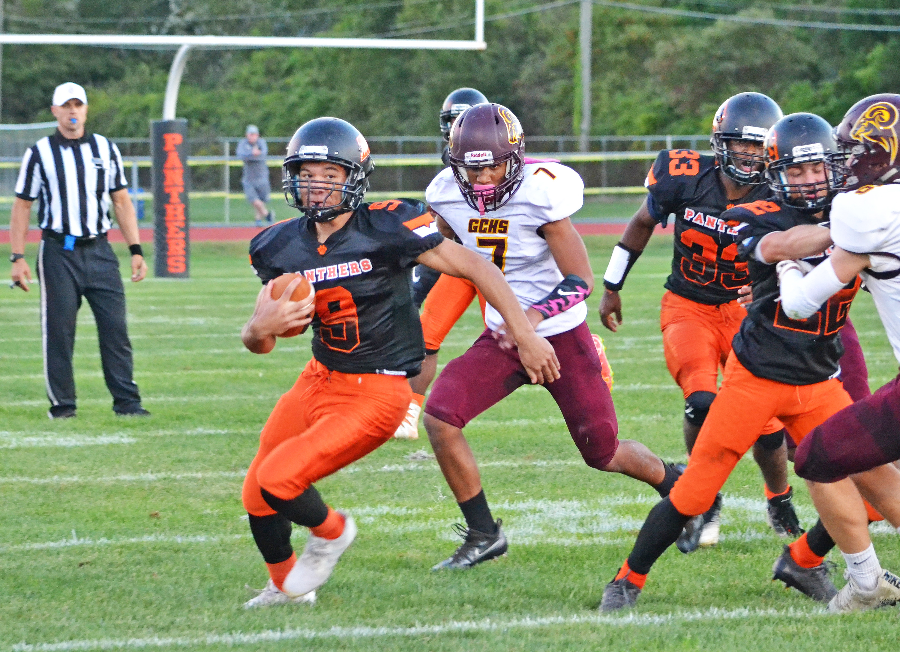 Middle Township's Seth Loeffler (9) runs through the defense for a first down in the Panthers' home game on Sept. 29 in Cape May Court House.