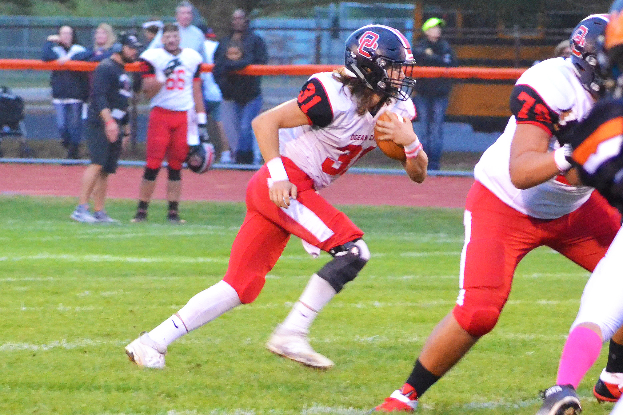 Ocean City quarterback Harry Pfeifle scored three touchdown's in the team's road win at Middle Township on Oct. 13.