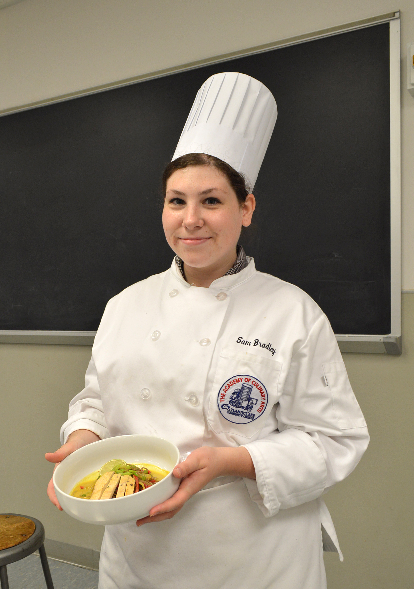 Sam Bradley of Berlin holds her dish