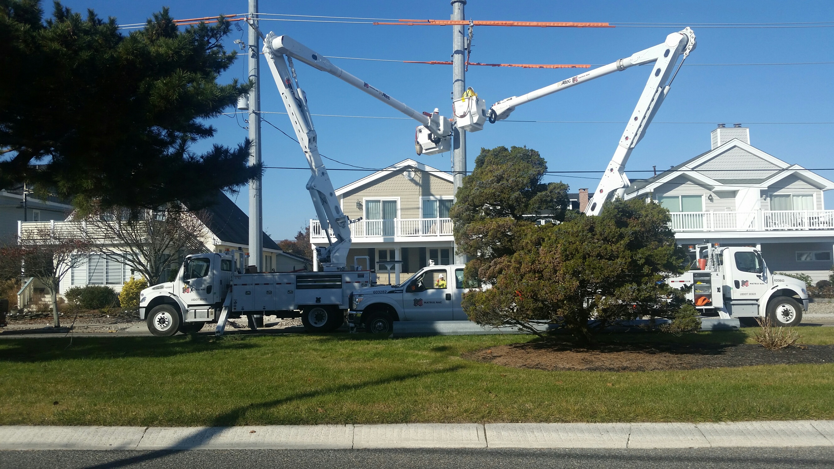 Equipment shifts the pole so that it no longer blocks access to the parking space.