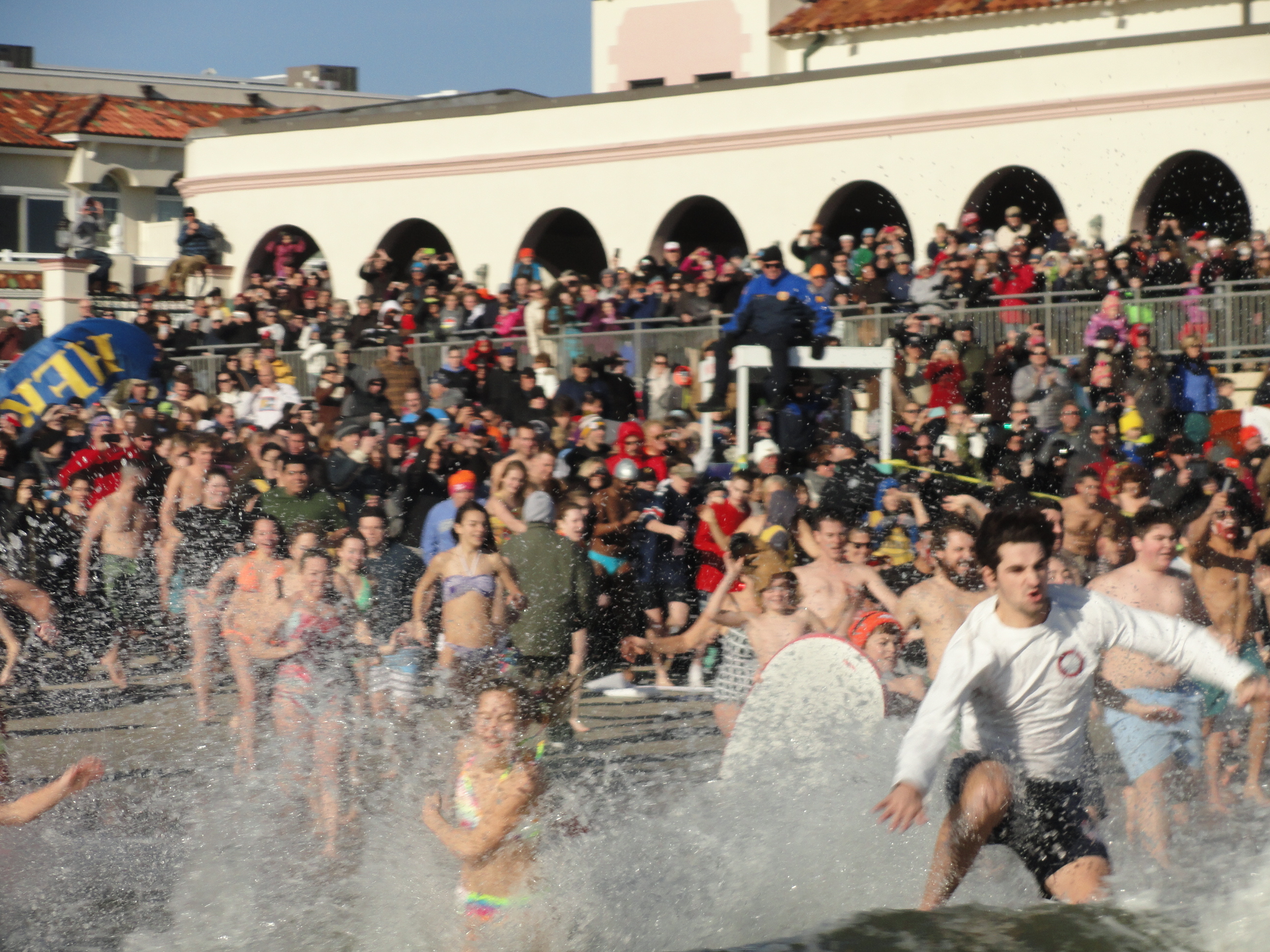 Participants head for the water in Ocean City’s 2017 traditional First Day First Dip. The 2018 event will not take place due to the extreme cold.