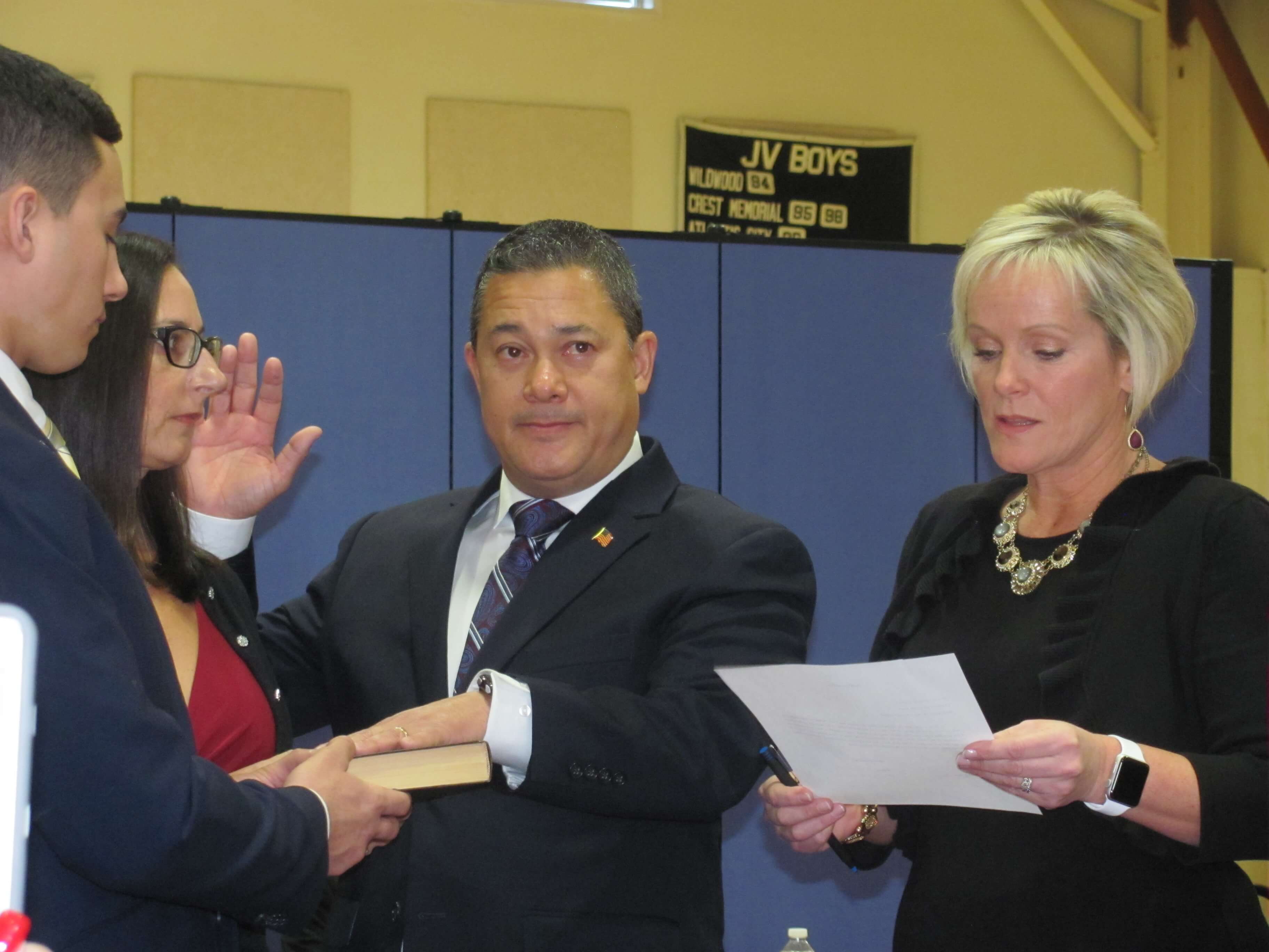 Mayor Don Cabrera takes the oath of office.