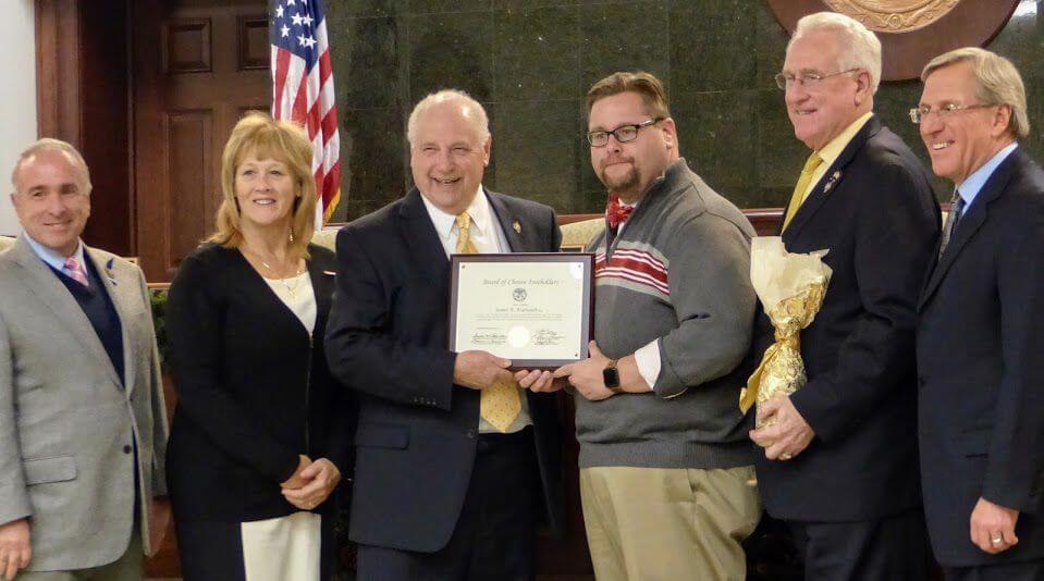 James Arsenault receives citation from freeholders Jan. 9 as he planned to depart as county counsel and take his oath Jan. 12 as a judge of compensation with the state Department of Labor and Workforce Development. Freeholders are