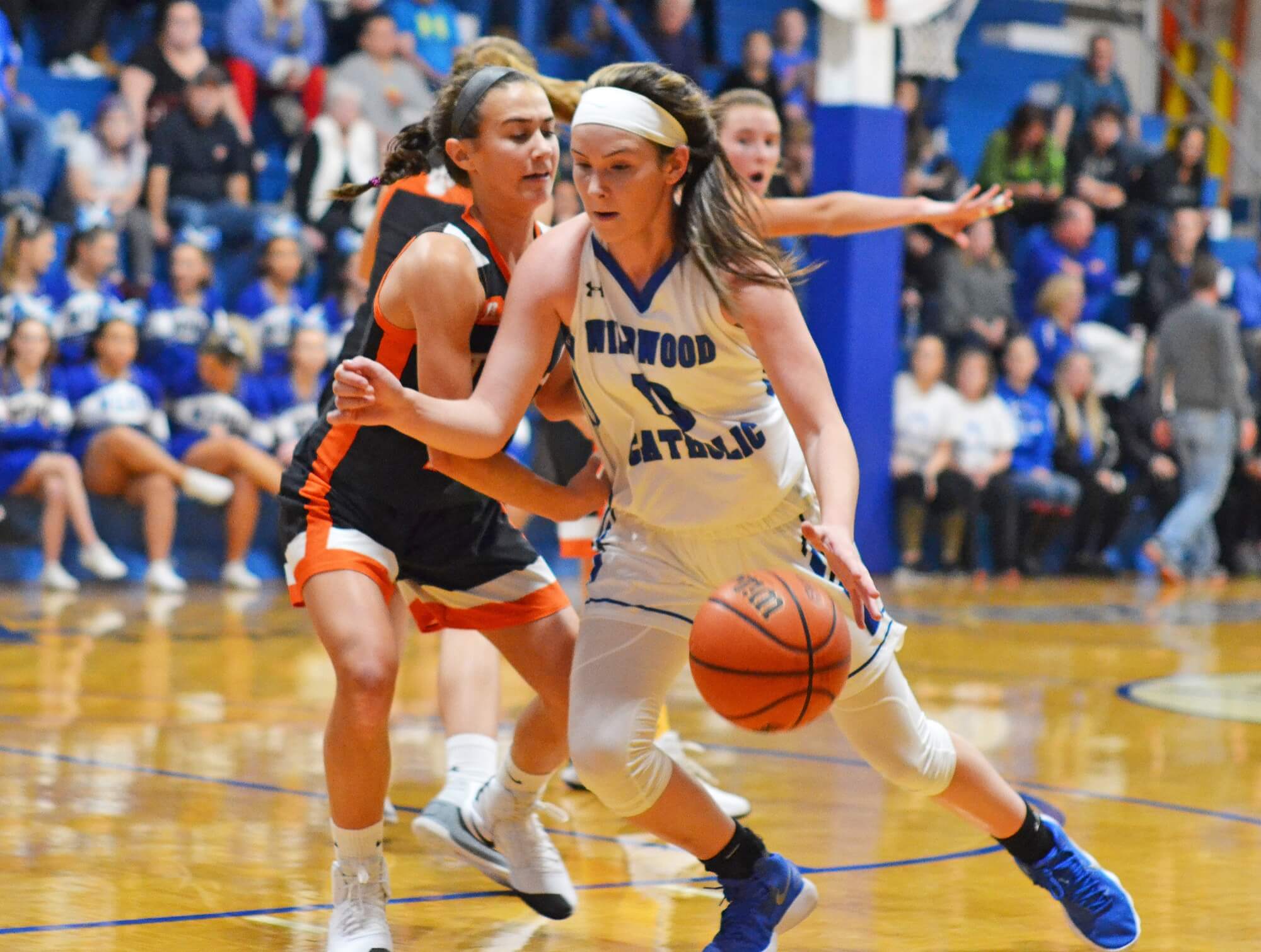 Wildwood Catholic's Marianna Papazoglou (13) takes on Middle Township's Kate Herlihy in action earlier this season. Both teams look to win in the post-season.