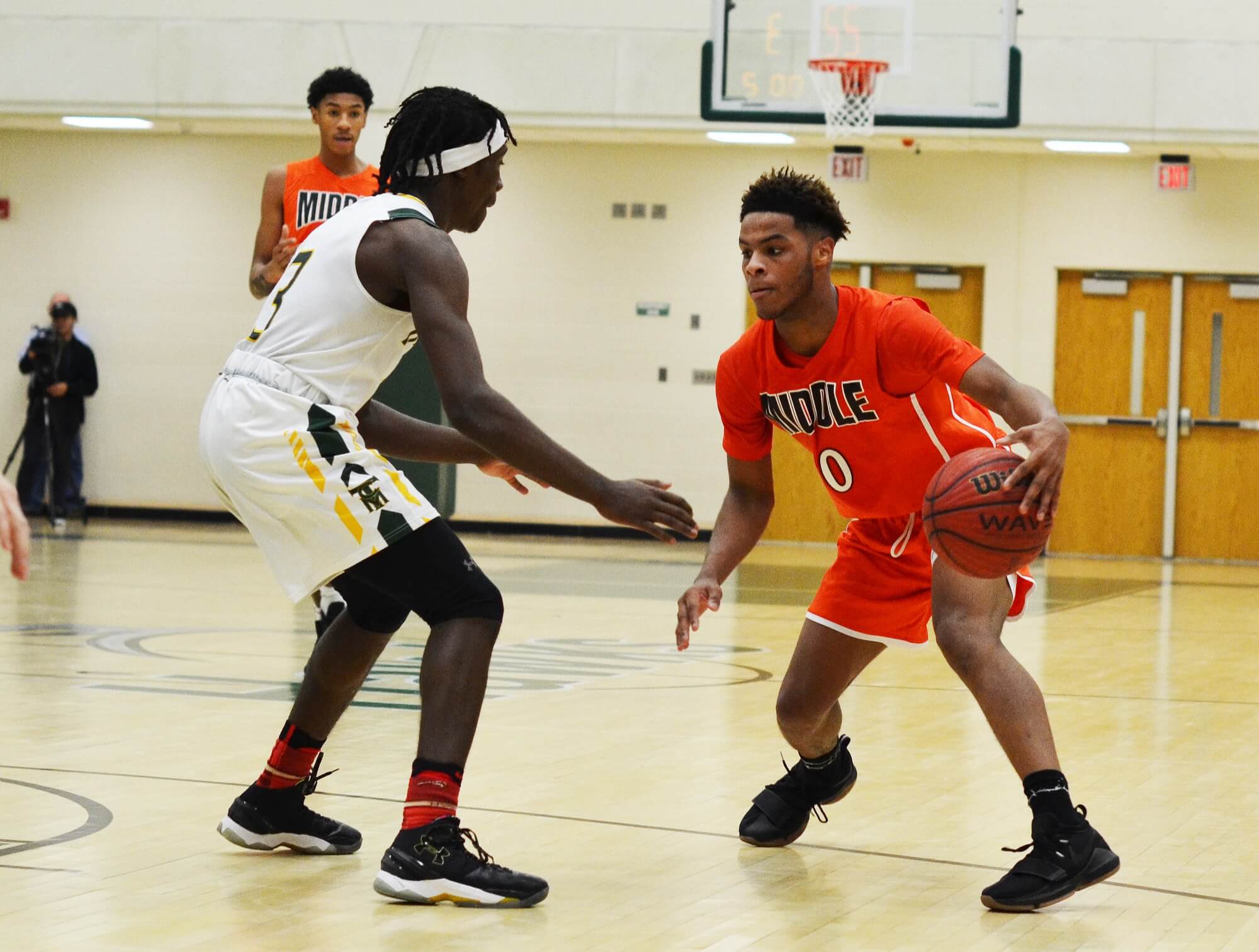 Middle Township's Jalen Freeman (0) takes on Cape May Tech's Josh Wright in a game earlier this season. Both teams will look for wins in the post-season.