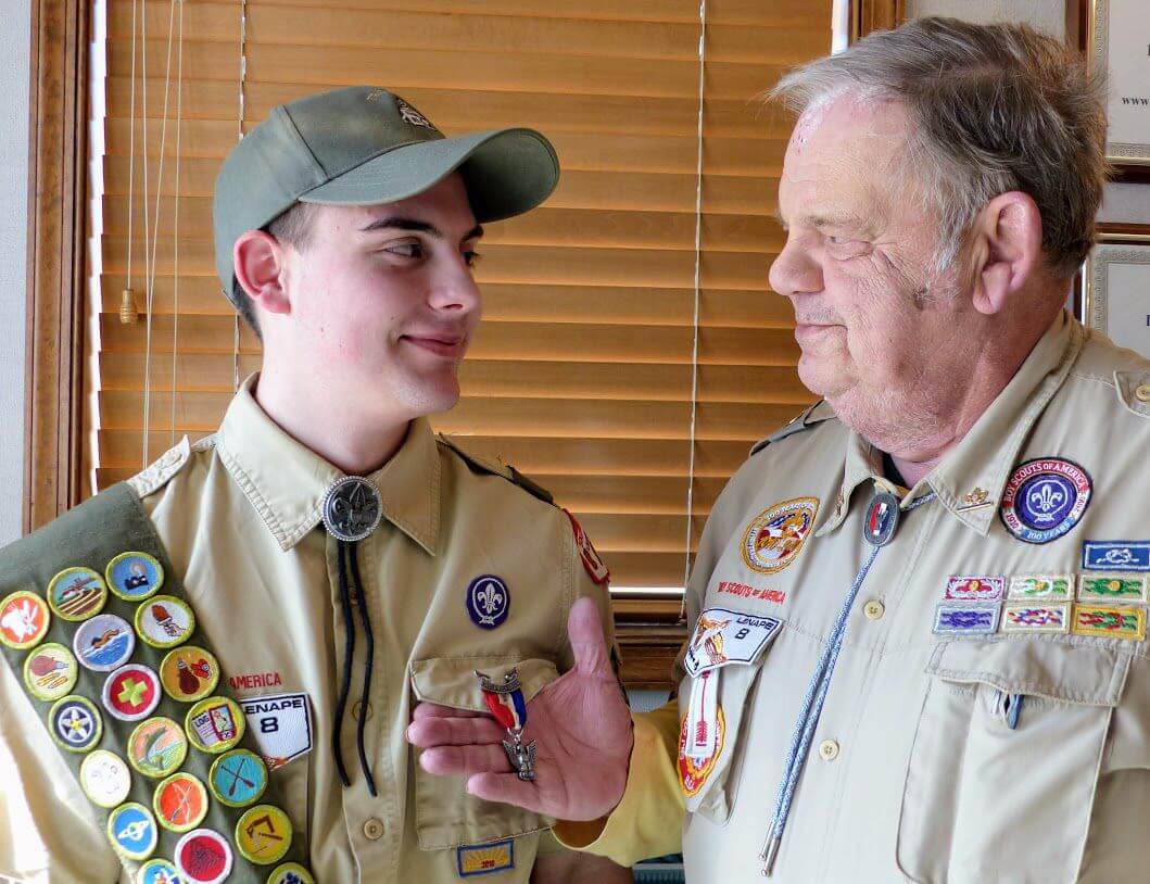 Eagle Scout Zachary Hearon wears the Eagle Scout pin awarded to his grandfather Russell Hayes in 1965.