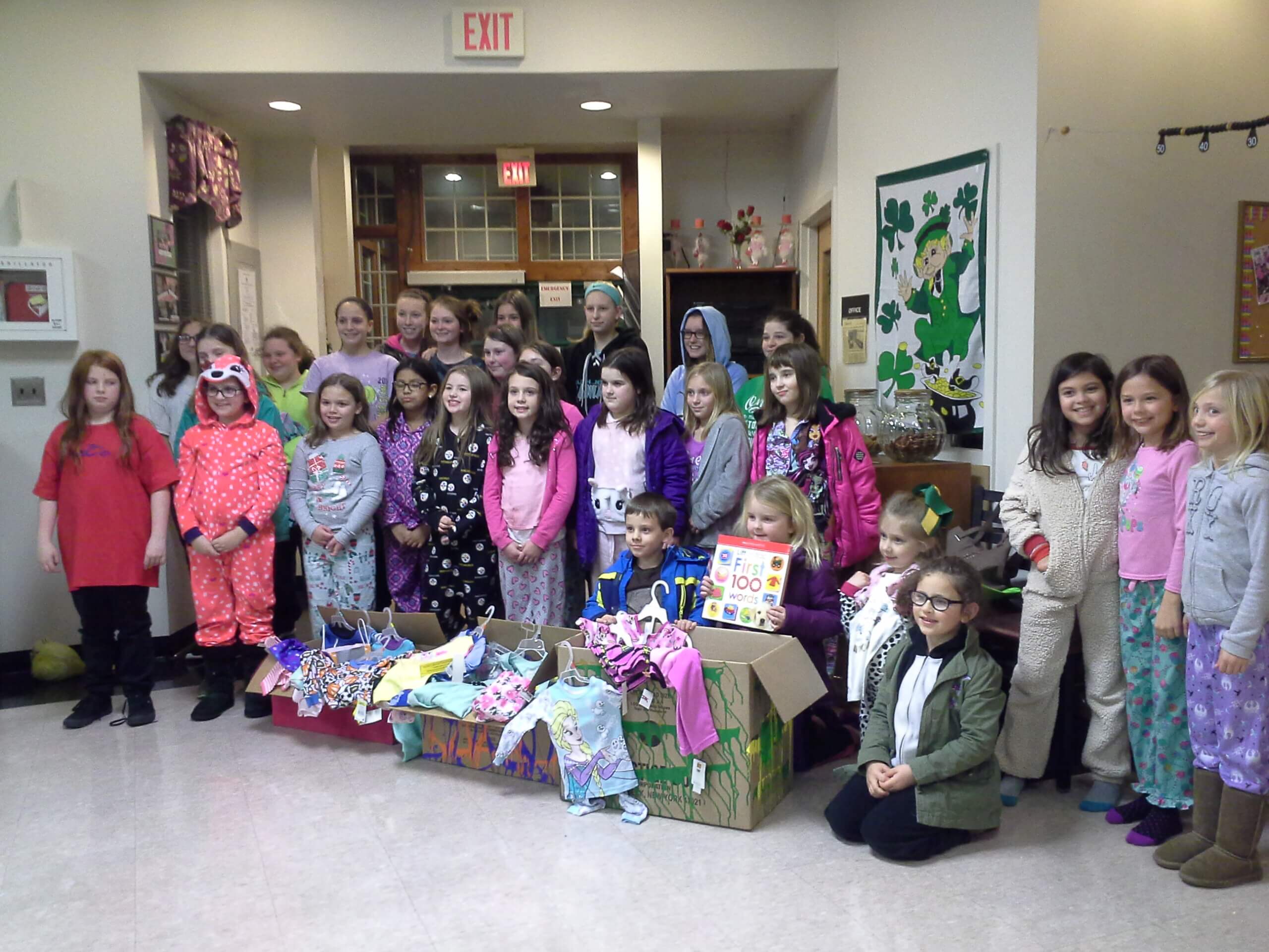 Girl Scouts from across Cape May County donated 43 sets of pajamas and nine books as part of movie night in Dennis Township.