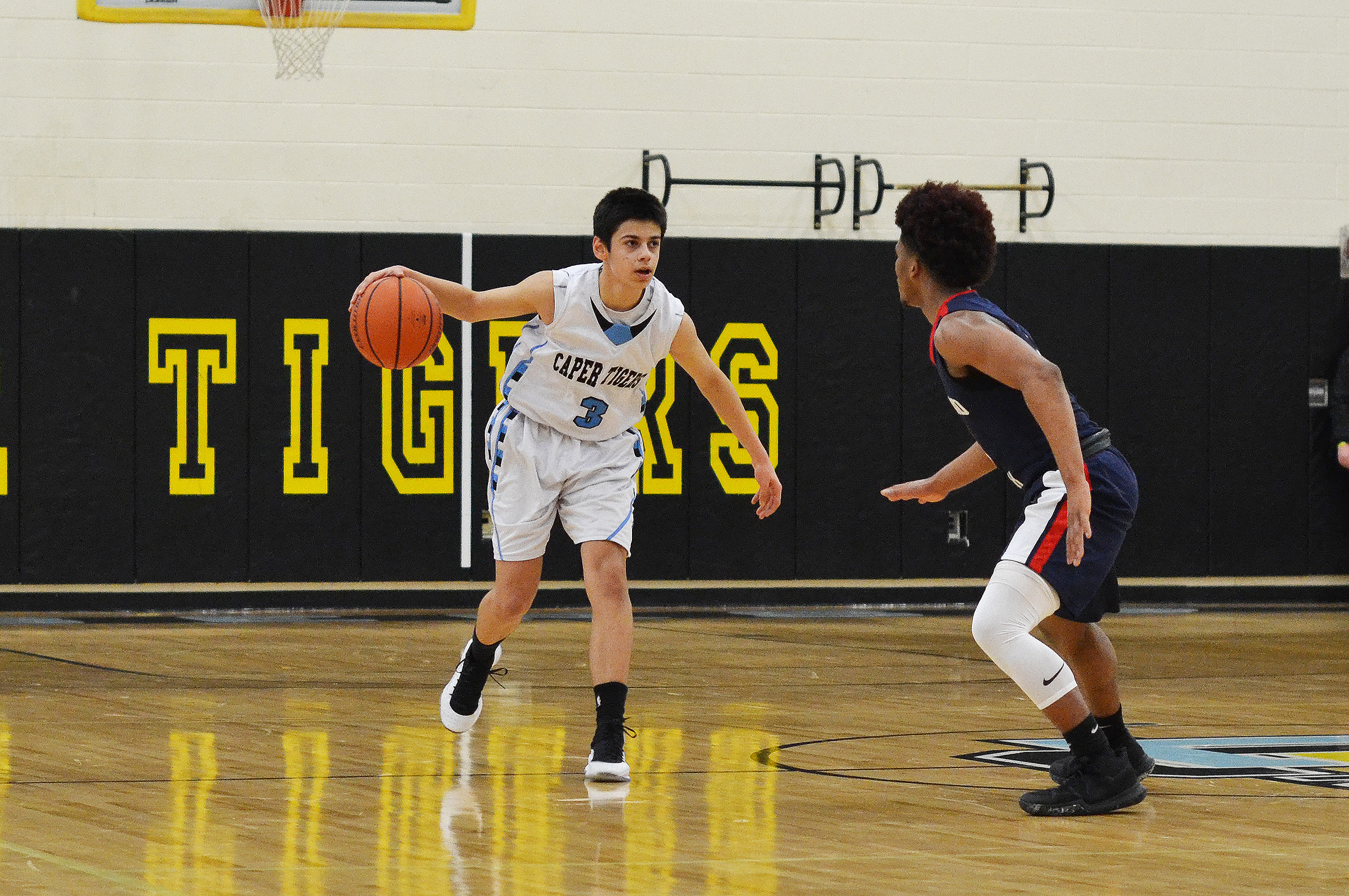 Lower Cape May's Martin Anguelov dribbles past a Medford Tech defender in the team's 72-61 quarterfinal win in Erma on March 1. Anguelov had 13 points in the win.