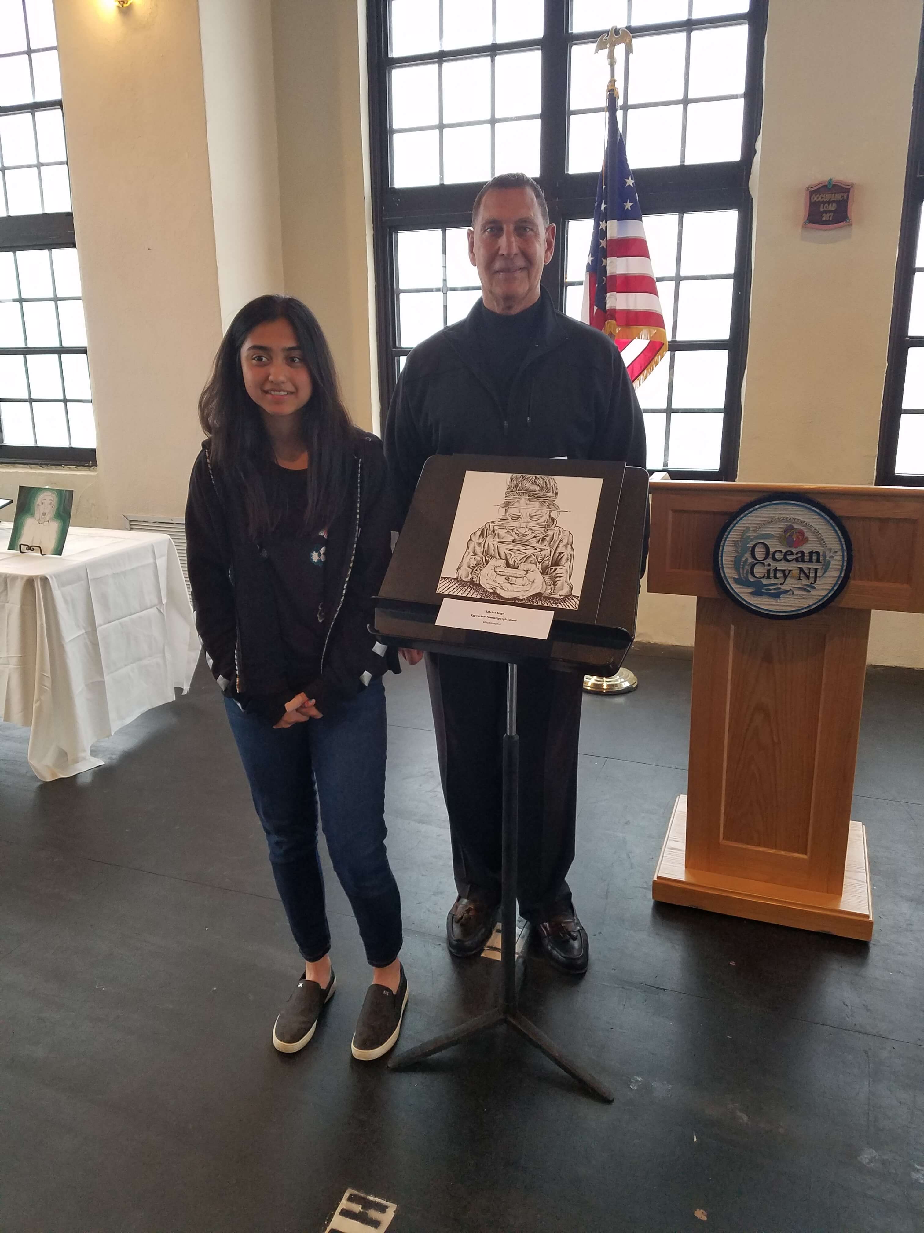 First-place winner Sabrina Singh of Egg Harbor Township High School poses with U.S. Rep. Frank LoBiondo (R-2nd).