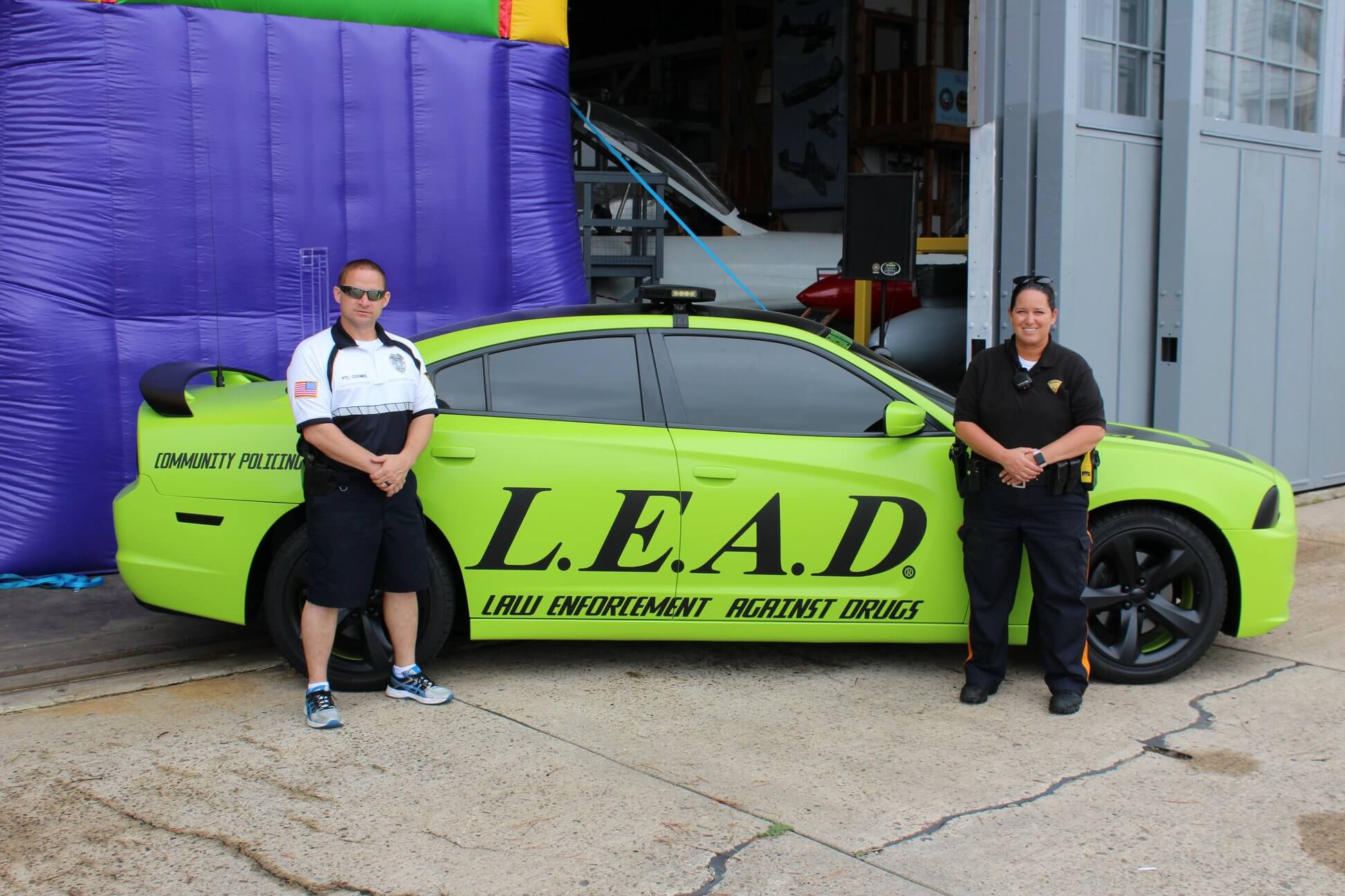 Lower Township Police L.E.A.D. car and L.E.A.D. officers Eric Coombs and Jennifer Anzelone Elwell.