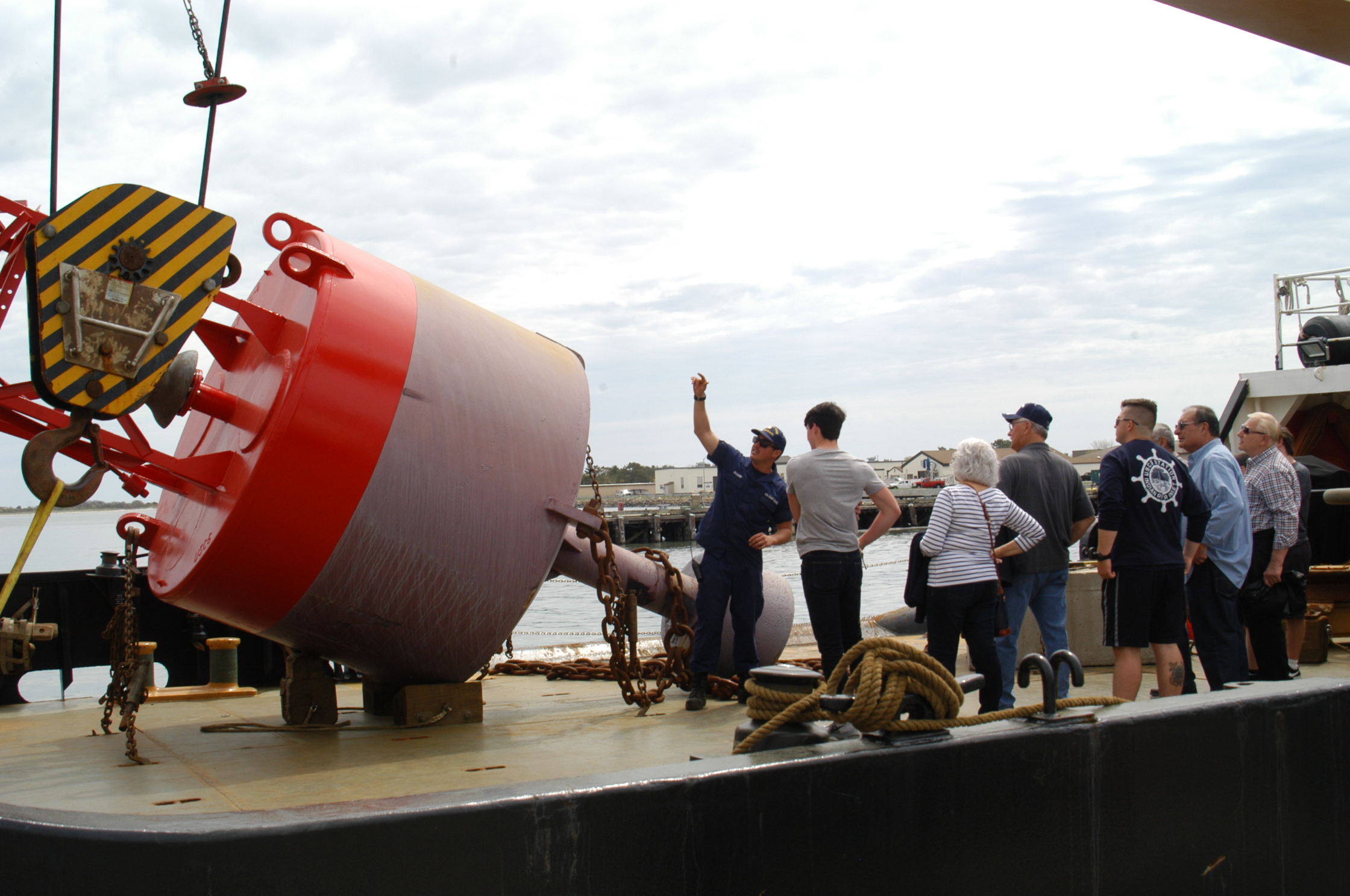 Coast Guard petty officer explains buoy aboard USCGC Ida Lewis for visitors during 4th Annual Cape May County Coast Guard Festival May 5. The cutter is homeported in Newport