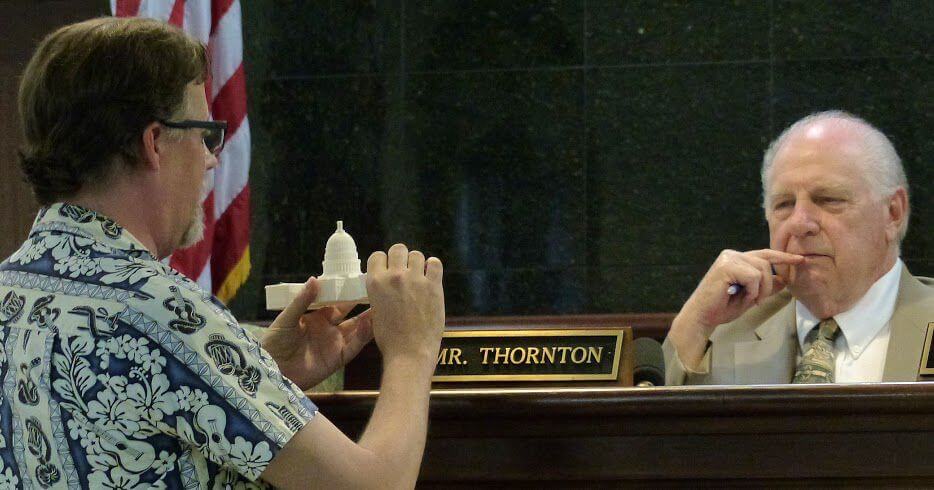 Jeff Trout shows Freeholder Director Gerald Thornton a model of the U.S. Capitol made on the County Library’s 3D printer. Photo by Al Campbell.