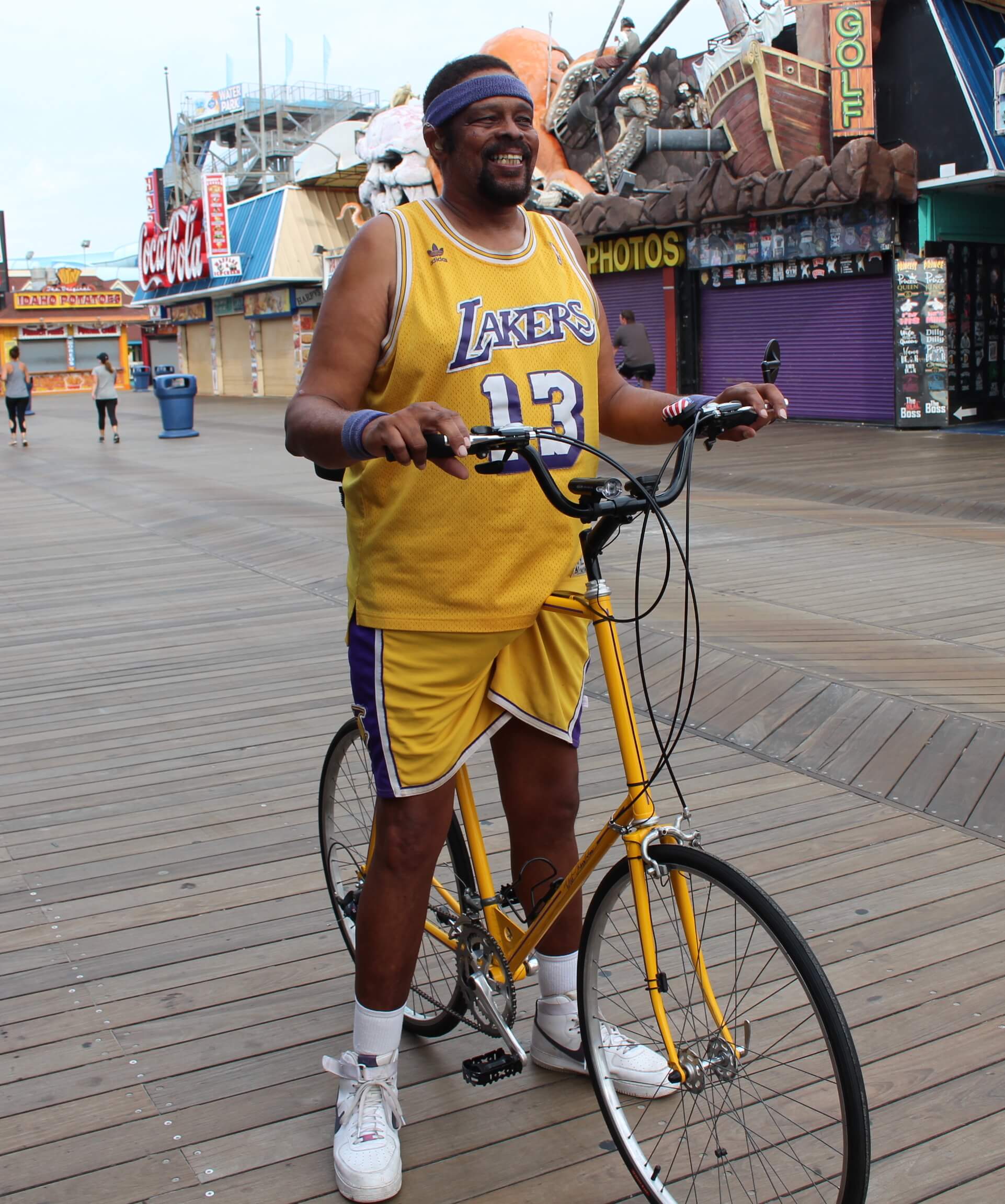 Wilmont Jones sits on his newly restored bike for the first time on the Wildwood Boardwalk June 6.