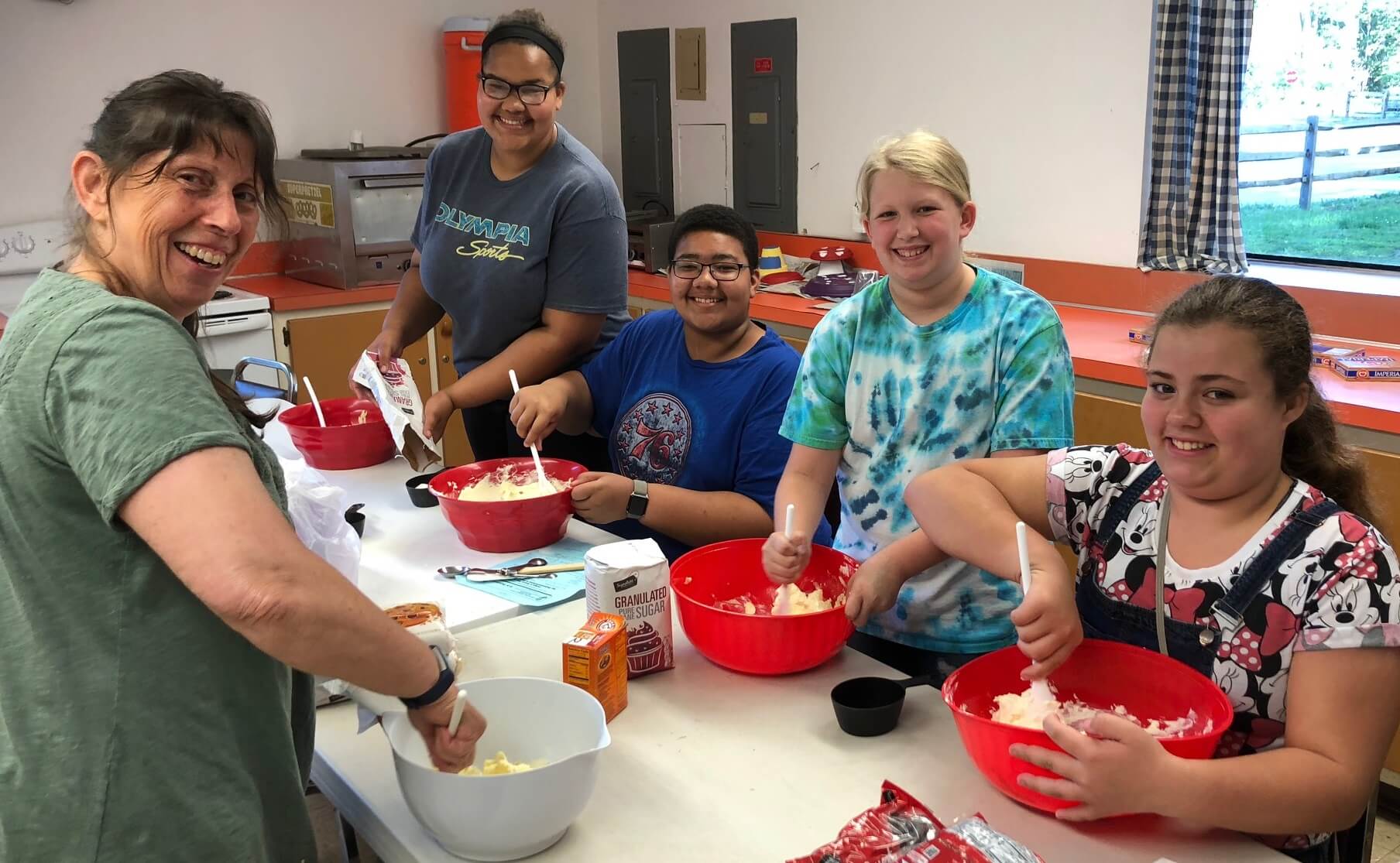 Club leader Gayle Crookston and members of the Kitchen Phanatics 4-H Club