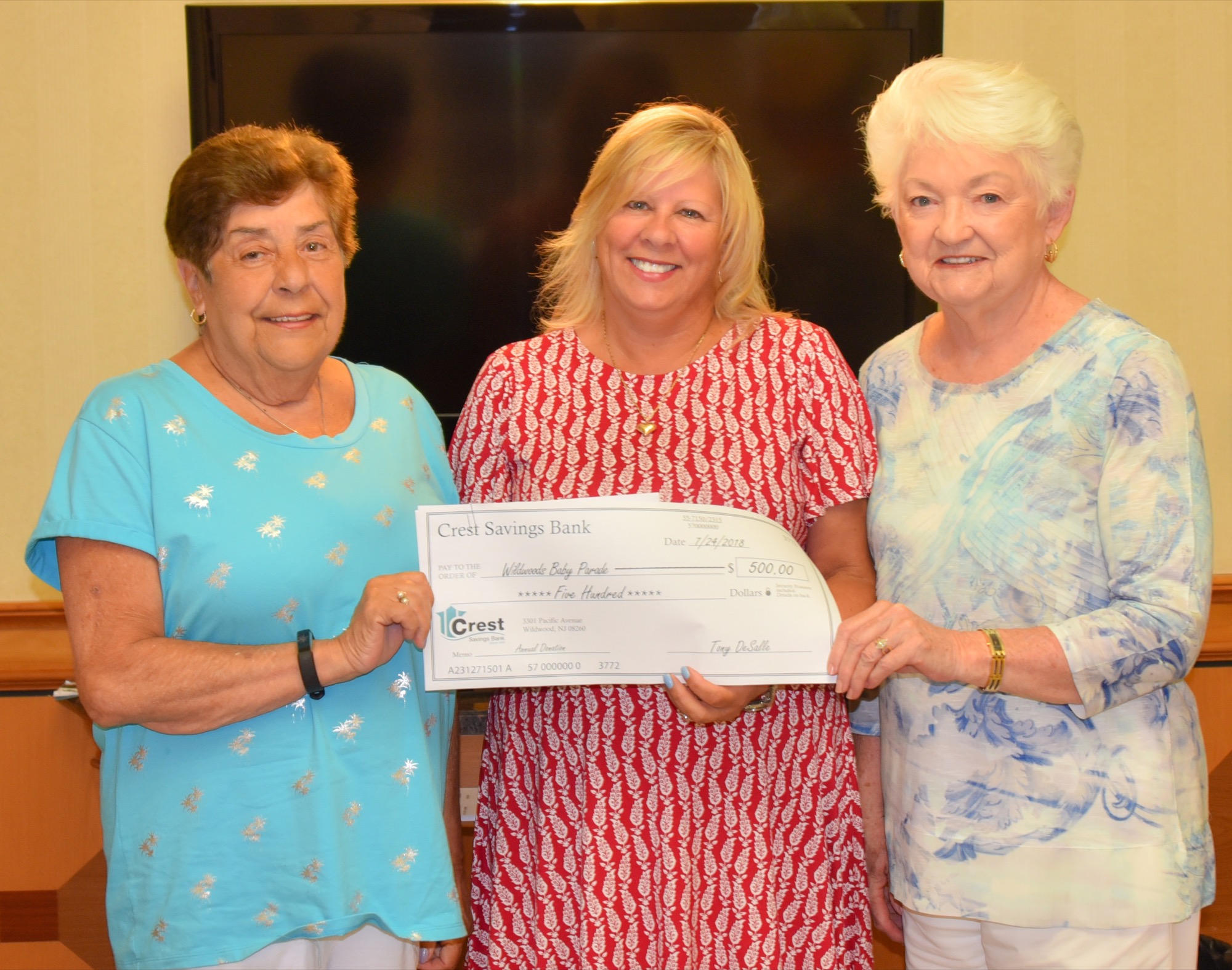 From left: Kay Sparkman of the Baby Parade Committee; Crest Savings Bank Senior VP and Branch Administrator Jodie DiEduardo; and Pat Cook of the Baby Parade Committee.