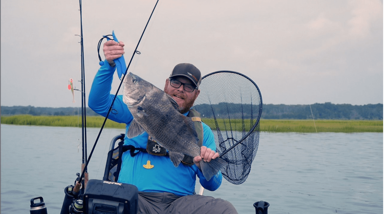 Jimmy Dickinson and his 10.1-pound puppy drum caught while kayak fishing.  