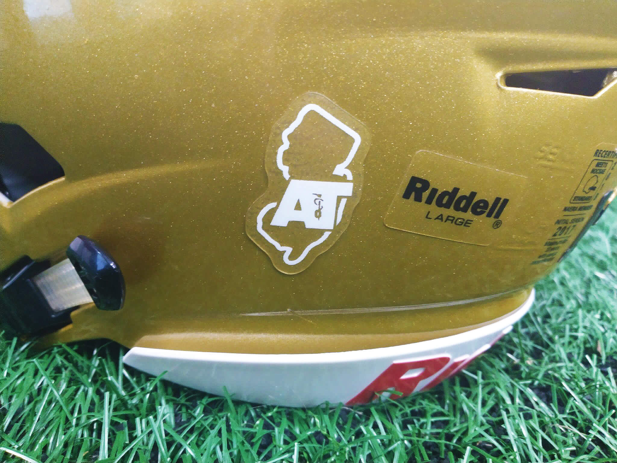 Athletic Trainer Advocacy decal on a Lower Cape May football helmet.