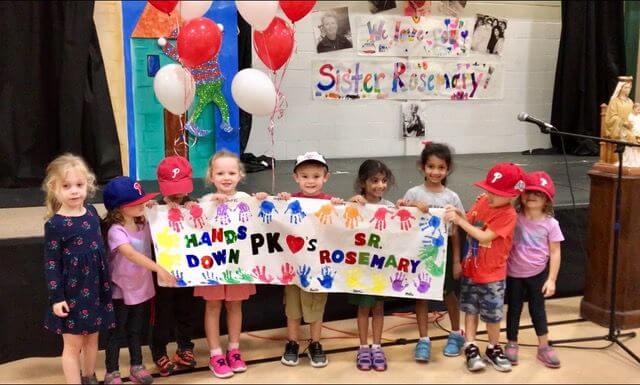 Pre-K students celebrate Sister Rosemary Powers.