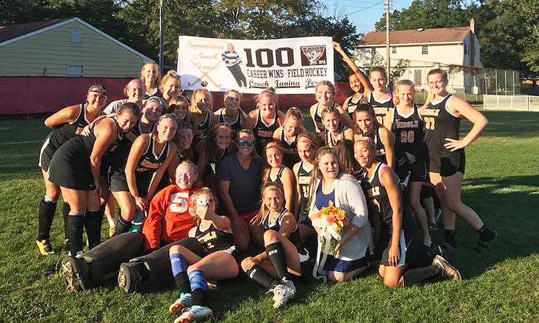 The Middle Township High School field hockey team celebrates head coach Janina Perna’s 100th career win in the Lady Panthers’ game on Oct. 3.