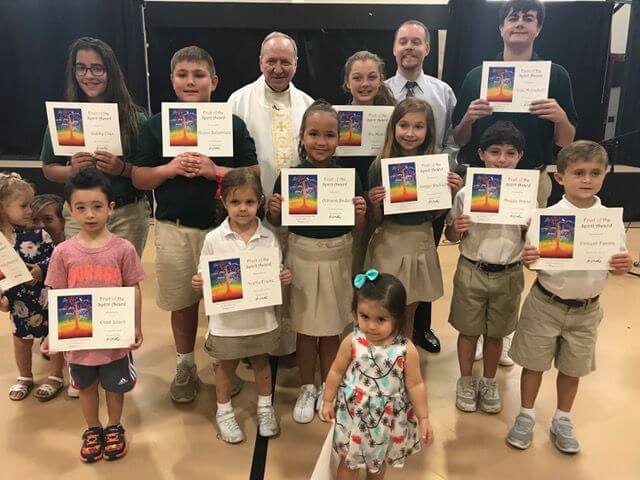 Students in preschool through grade 8 were recognized for embodying the Gospel value of love at Bishop McHugh Regional Catholic School in Sept. 2018.