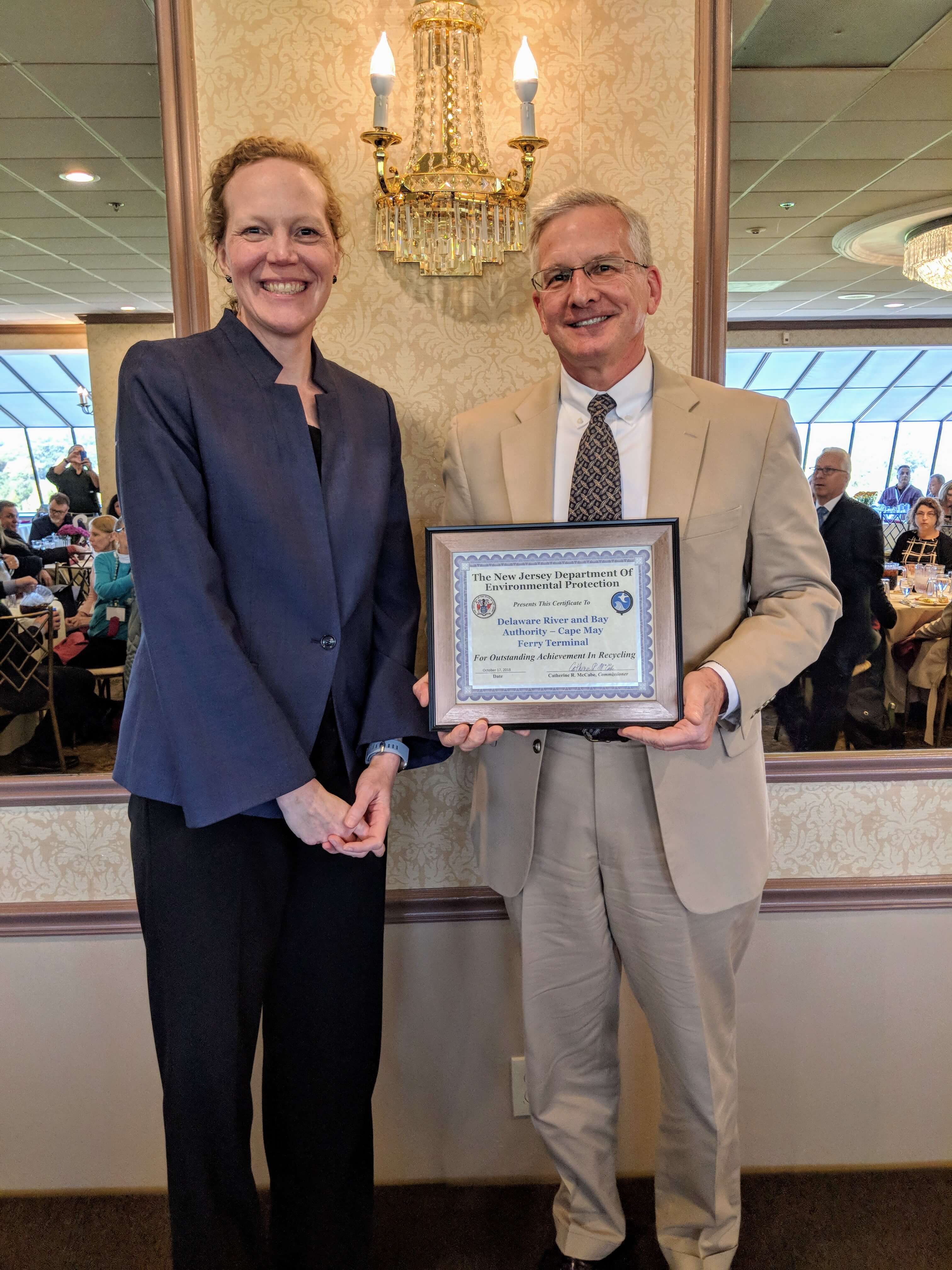 DRBA Environmental Compliance and Safety Manager Albert Fralinger III receives NJDEP 2018 Outstanding Recycling Award from NJDEP Deputy Commissioner Debbie Mans at the 38th Annual Recycling Symposium and Awards Luncheon held at the Jumping Brook Country Club in Neptune