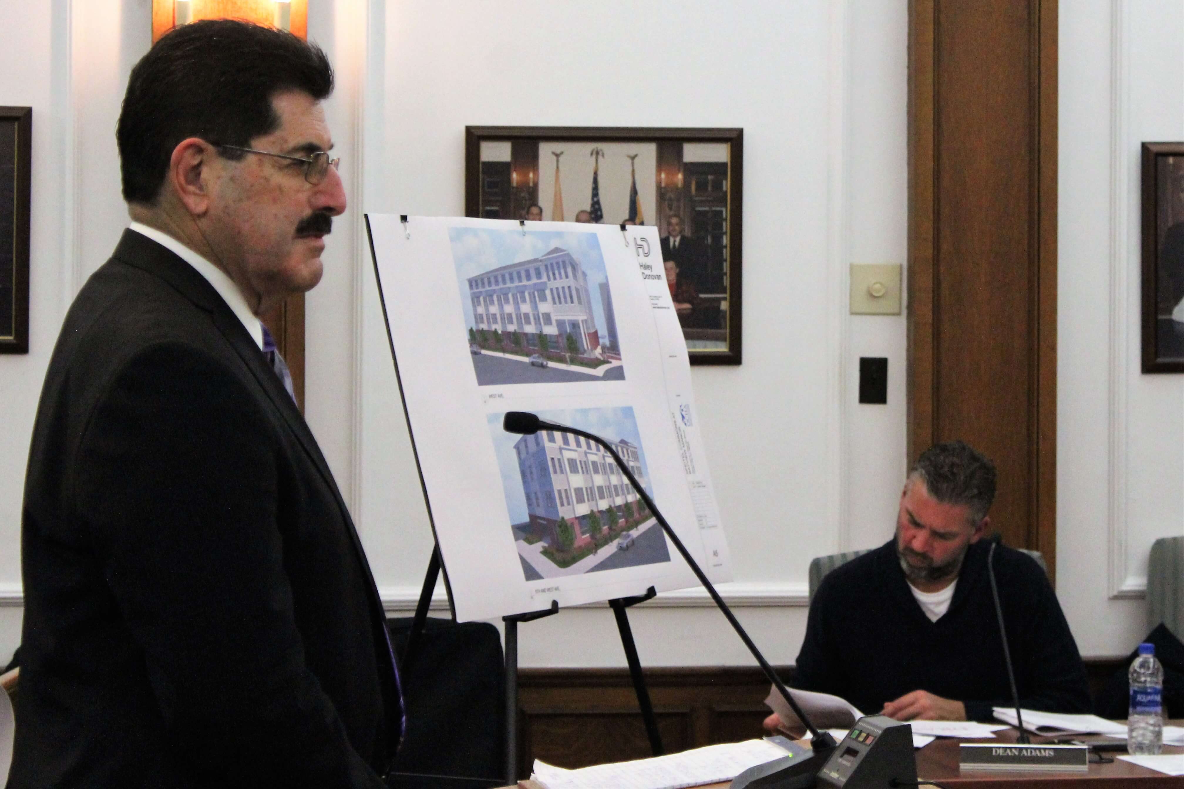 Housing Authority attorney Charles Gabage presents plans for an expanded project on West Avenue