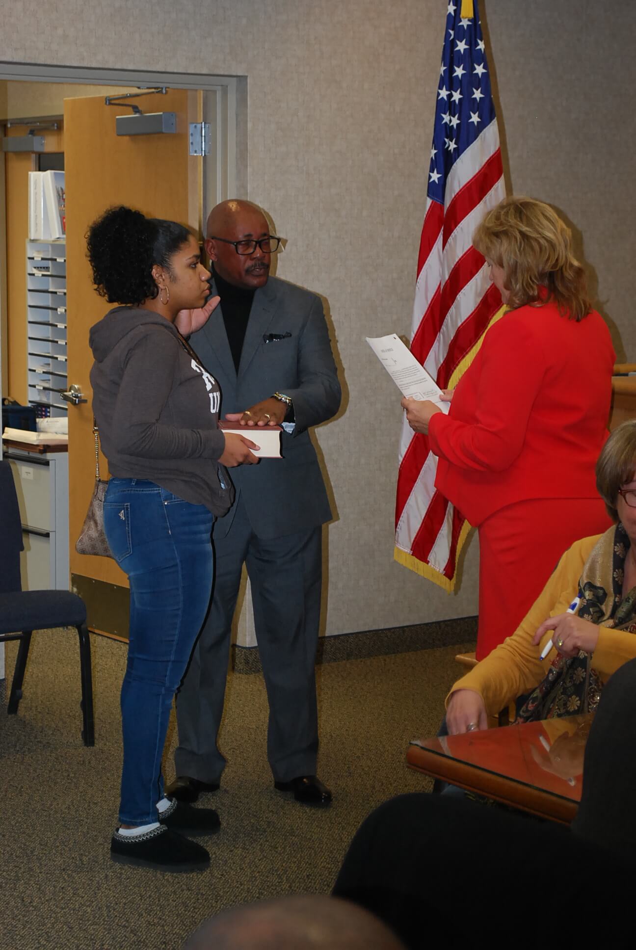 Woodbine Borough Councilman Joseph E. Johnson III begins his second term after taking his oath from Freeholder E. Marie Hayes Jan. 3.