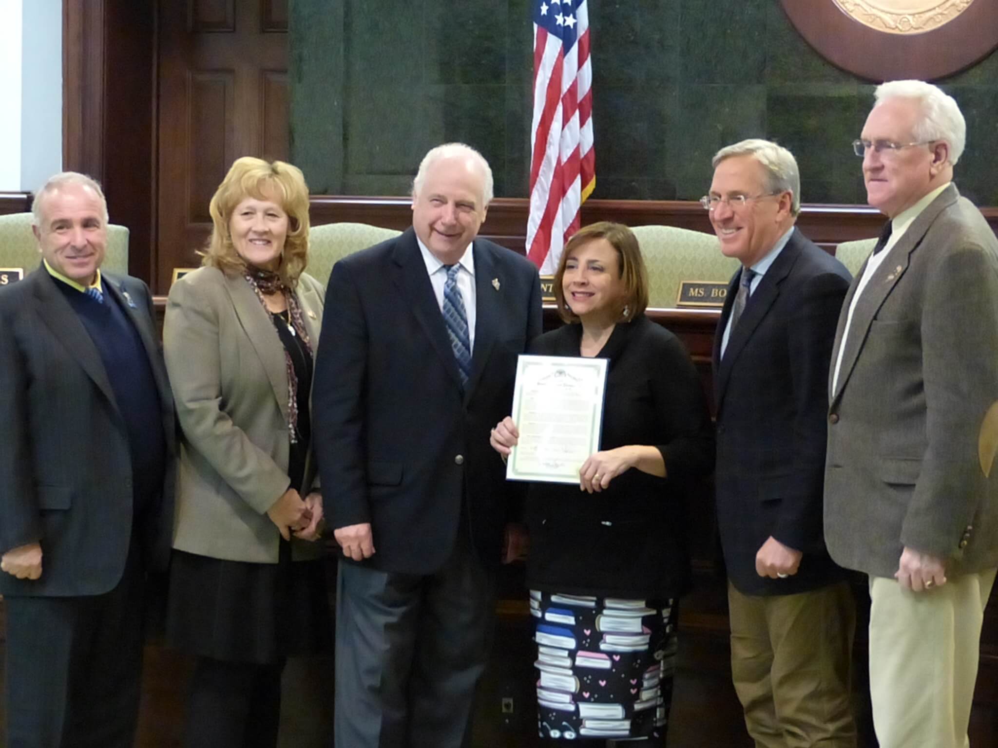 Ocean City High School Librarian Joan Vicari accepts a resolution from freeholders Jan. 22 on being named the 2018 New Jersey Association of School Librarians Outstanding Specialist.