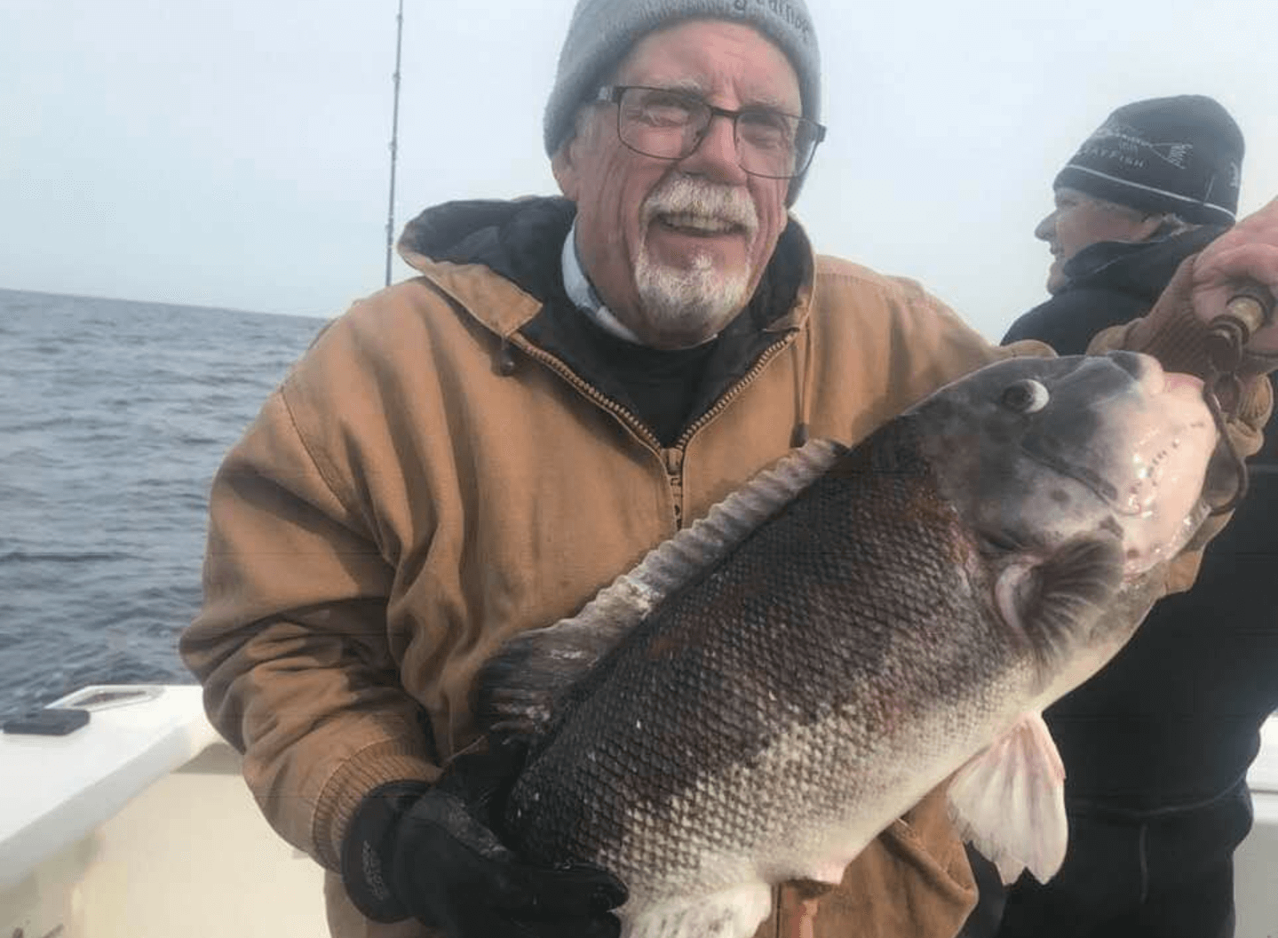 Ron McClelland and his 13-pound blackfish.