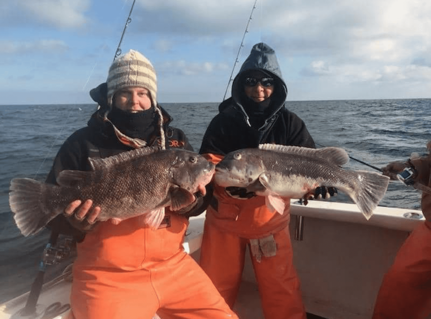 Two anglers and their blackfish