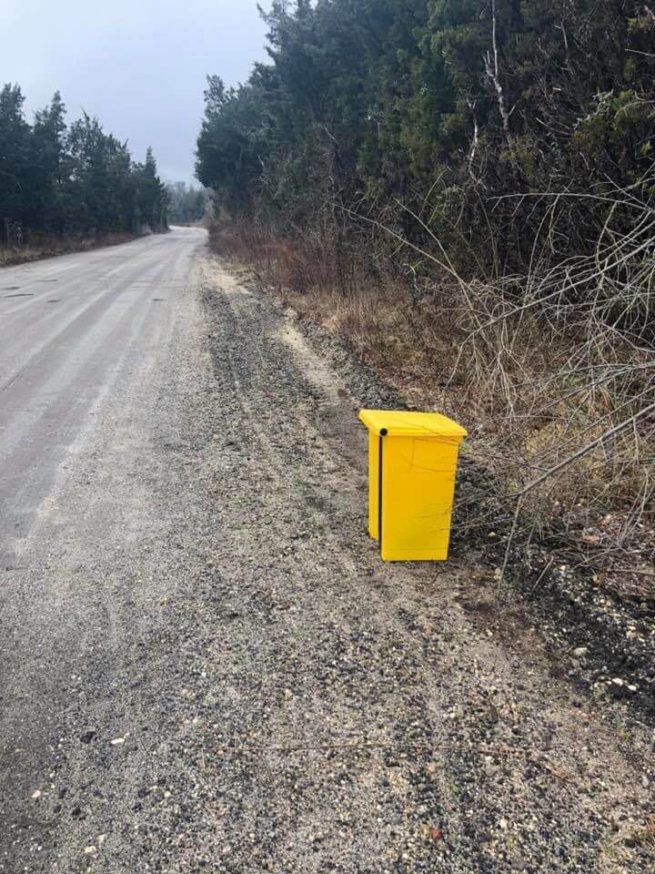 Trash can in which a dog was found and later died.