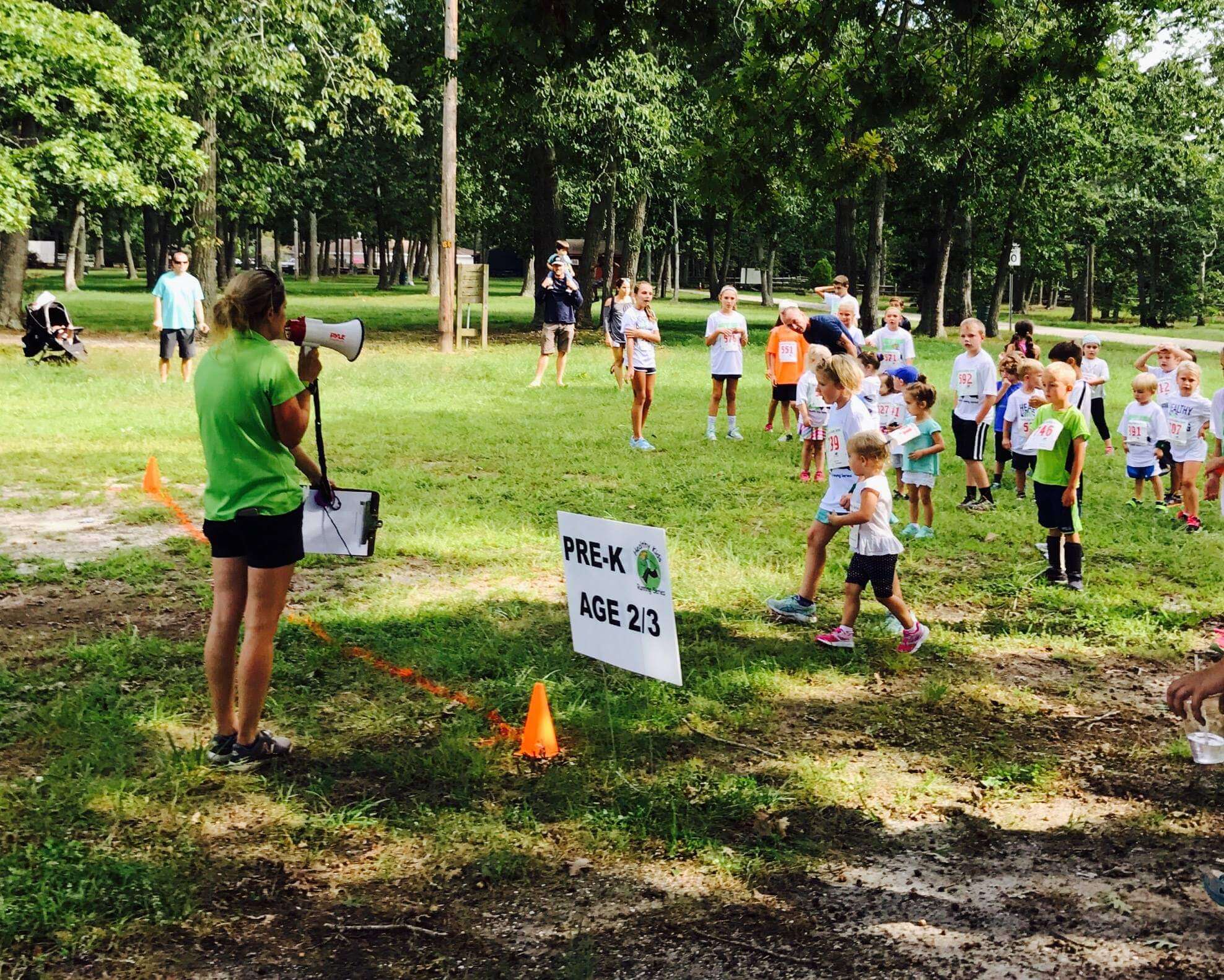 The younger youths get ready to dash across the field at the county 4-H grounds on Court House-South Dennis Road.