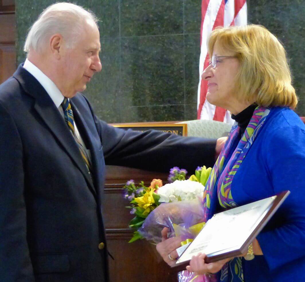 Marilou Rochford chats with Freeholder Director Gerald Thornton Feb. 28 after a photograph with the entire board. The outgoing department head of Rutgers Cooperative Extension Service in Court House said it will be left to Rutgers University officials to name her replacement.