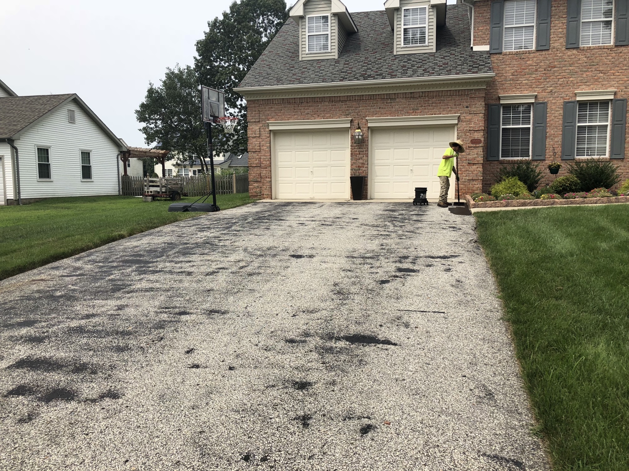 Residential driveway before. 