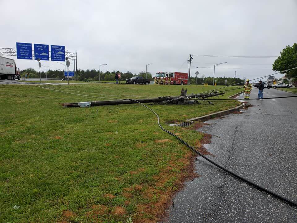 Utility poles on ground on Ferry Road May 13.